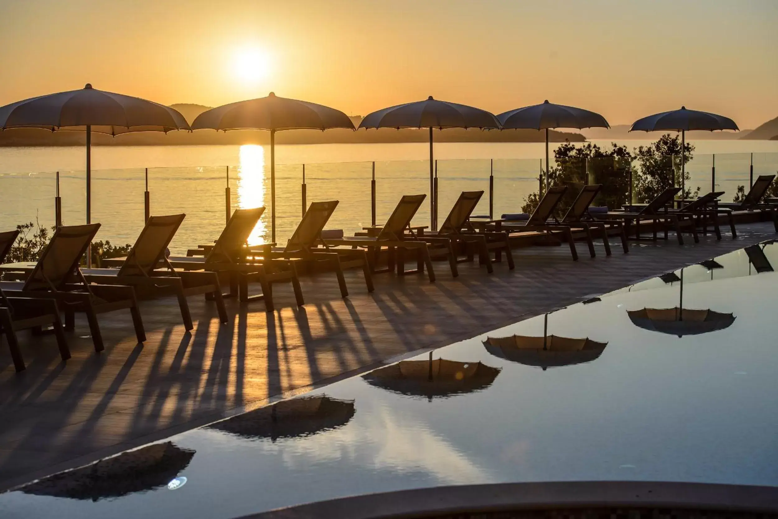 Patio, Swimming Pool in Royal Blue Hotel