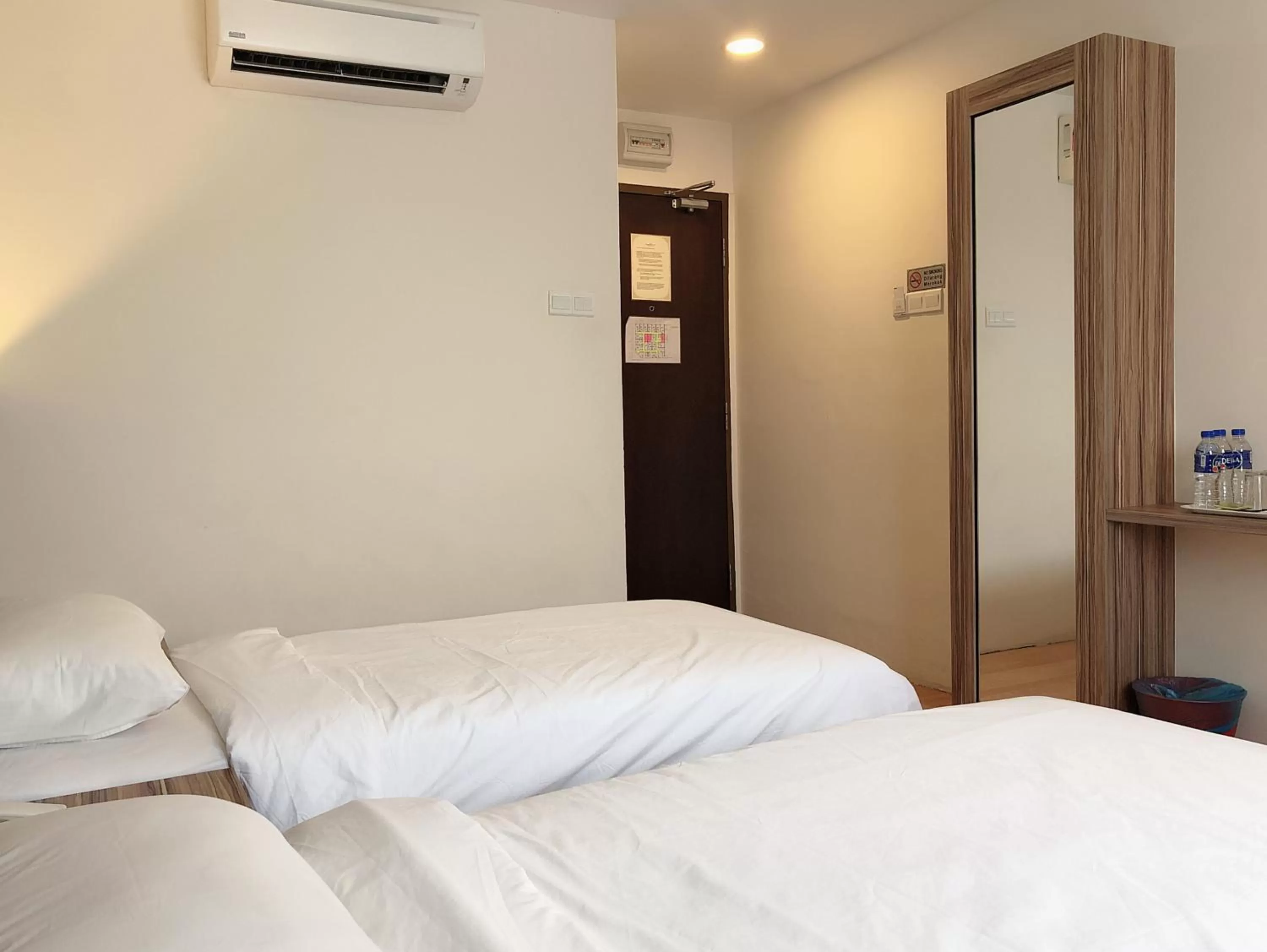 Bed in Tumike Hotel Bentong