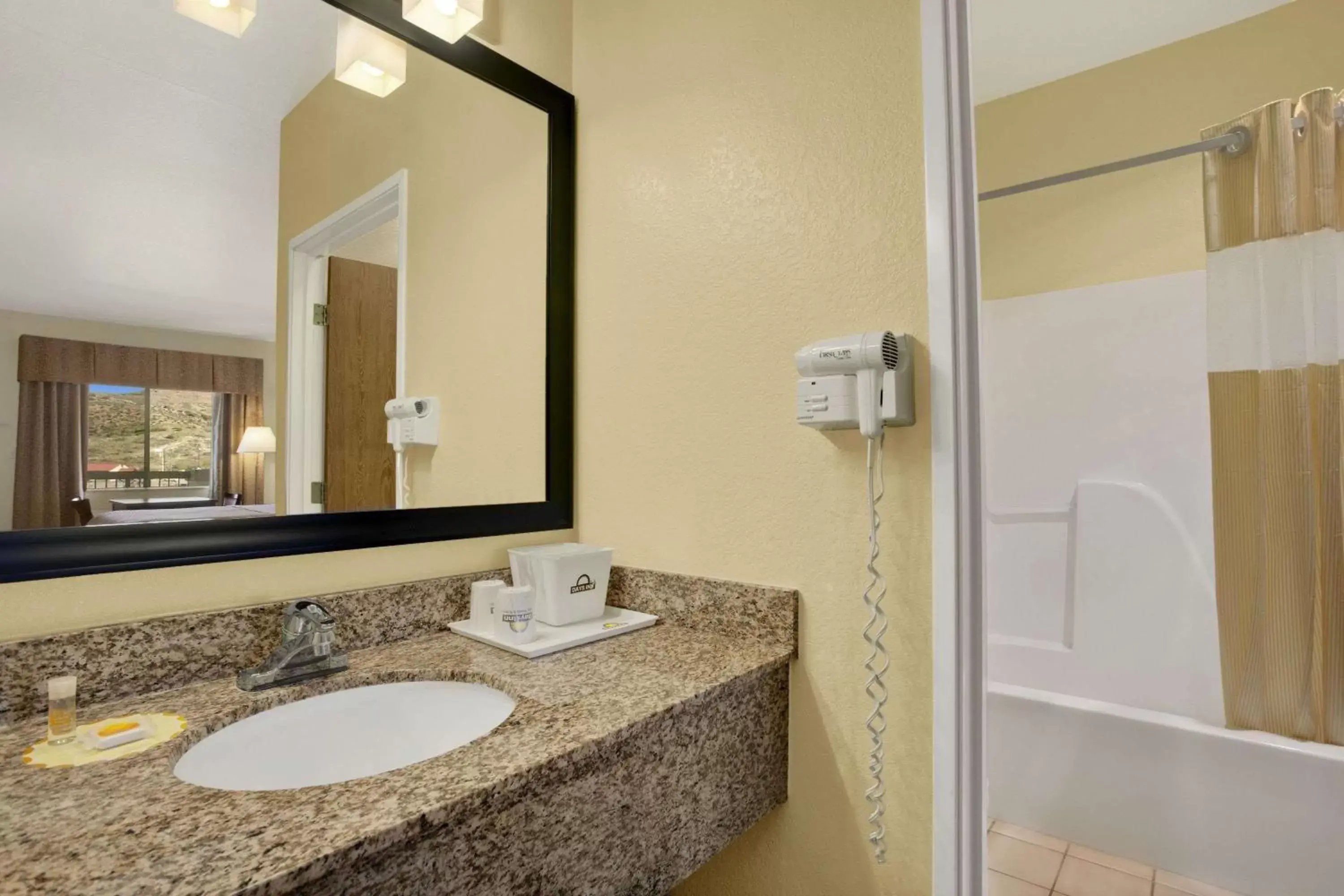 Bathroom in Days Inn by Wyndham Globe