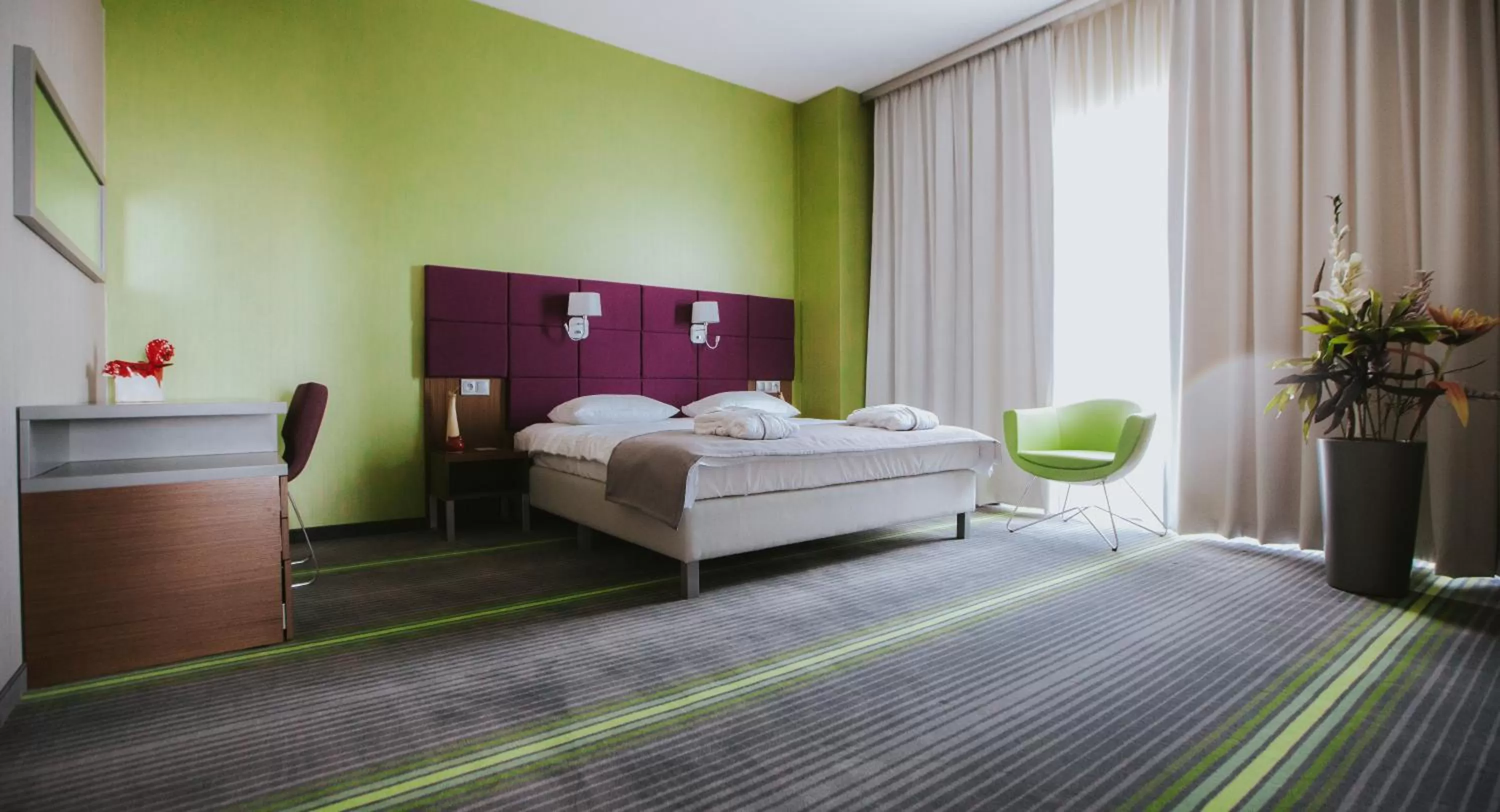 Living room, Bed in Hotel Radocza Park Business & Spa