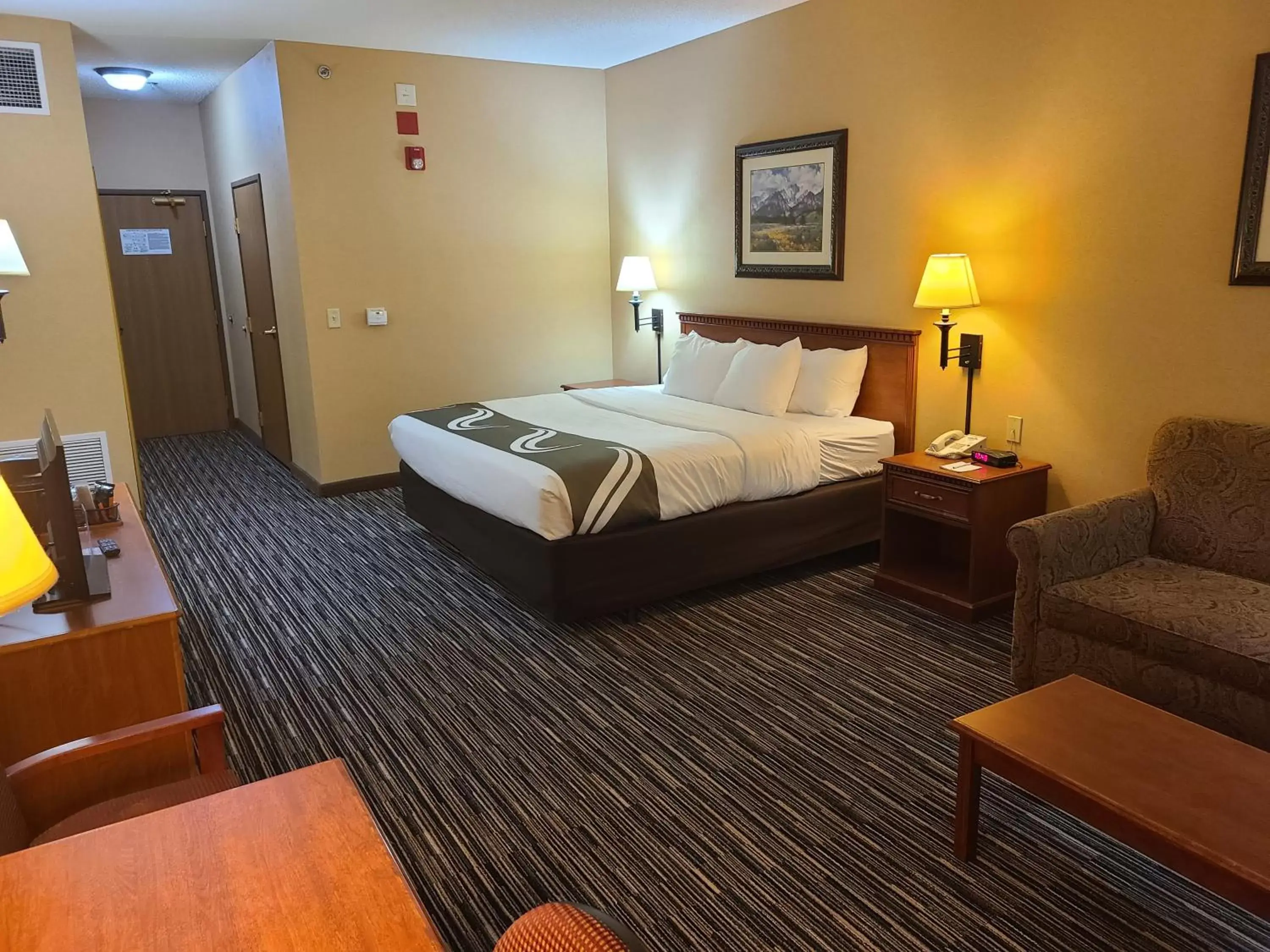 Bed in Quality Inn & Suites Wellington – Fort Collins