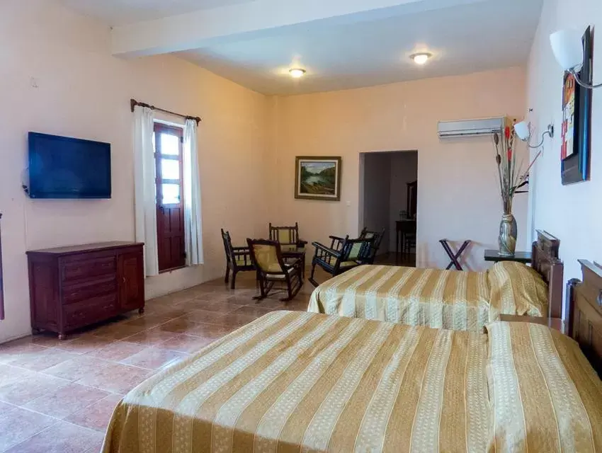 Photo of the whole room, Bed in Posada Doña Lala