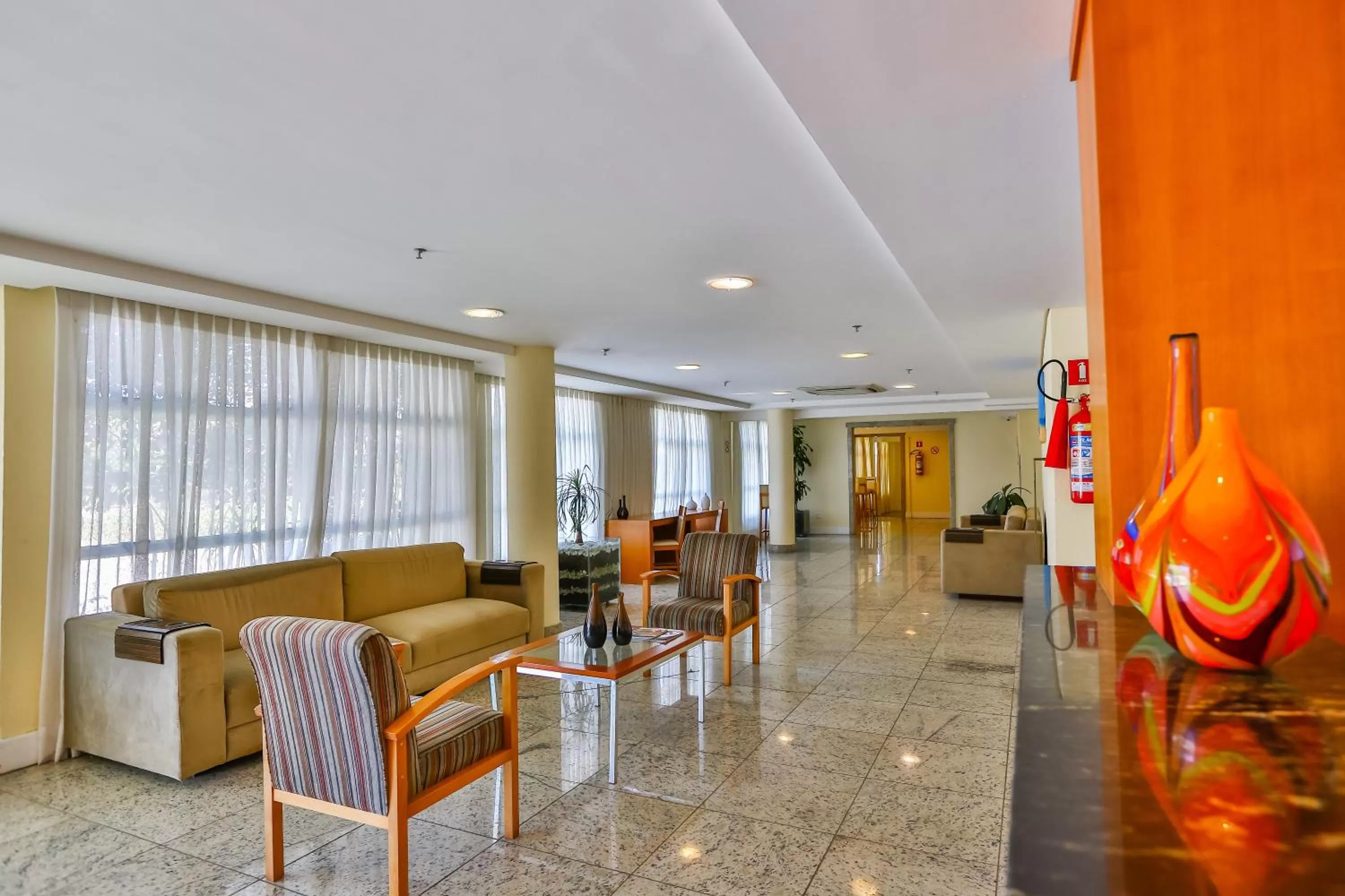 Lobby or reception in Dubai Macaé by Atlântica