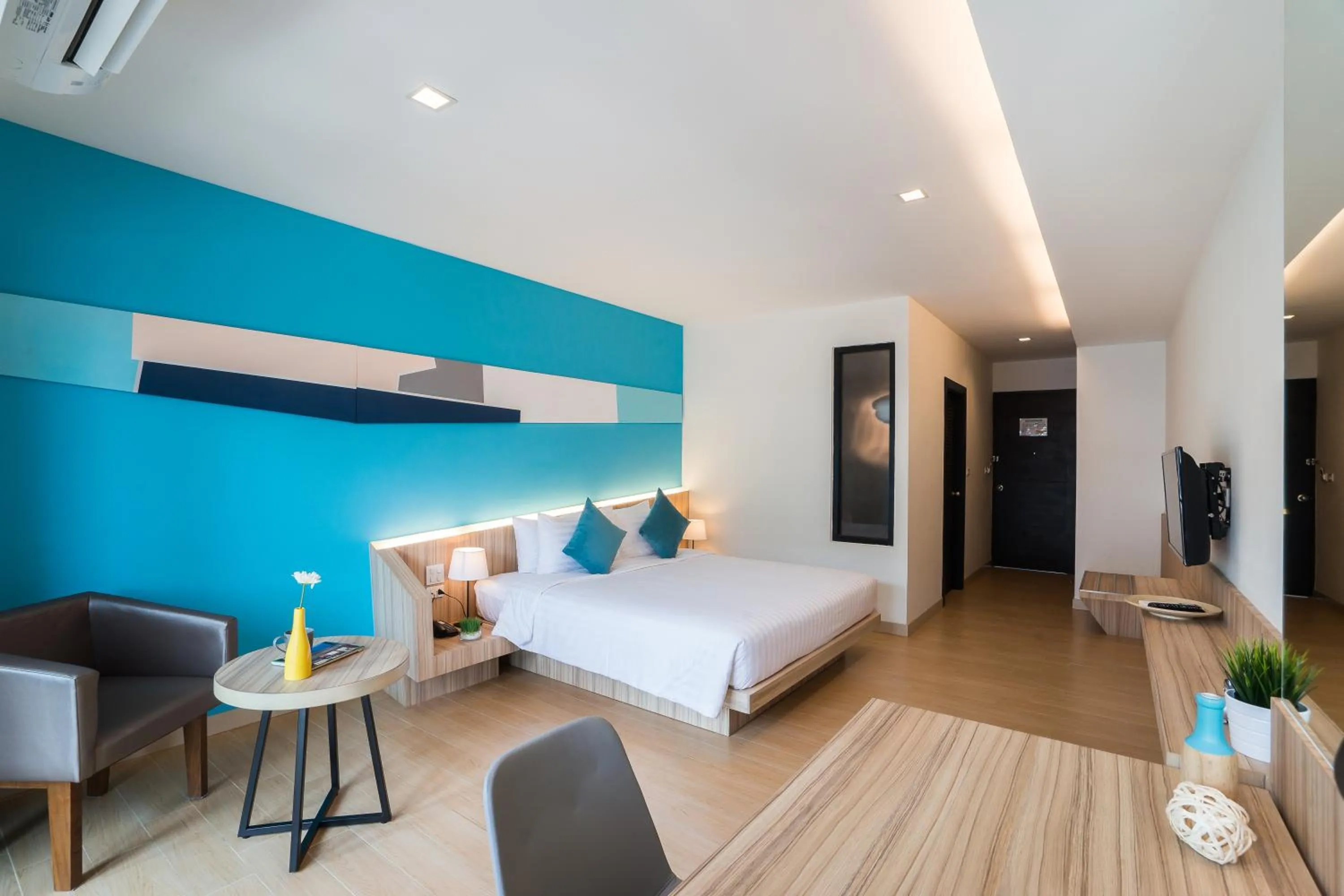 Bed in J Inspired Hotel Pattaya