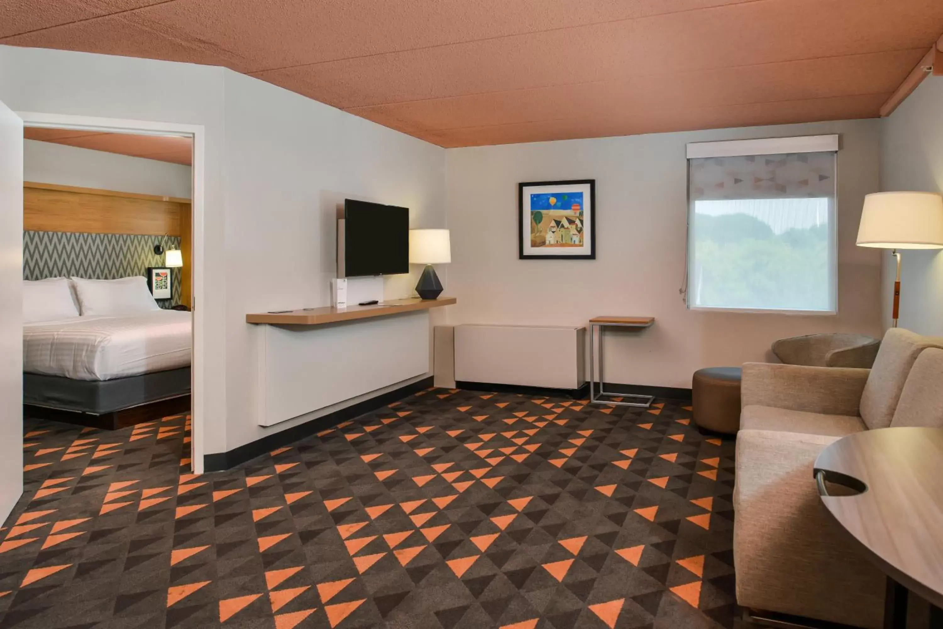 Photo of the whole room, TV/Entertainment Center in Holiday Inn Auburn-Finger Lakes Region, an IHG Hotel