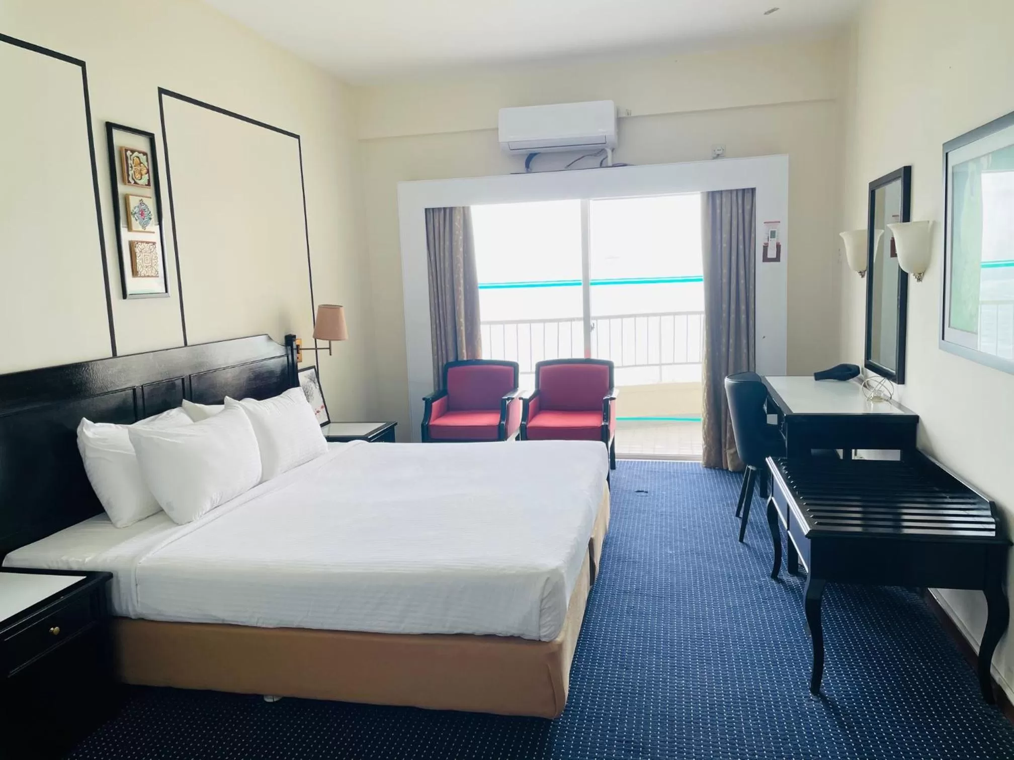 Bedroom in Seaview Suite at Rainbow Paradise