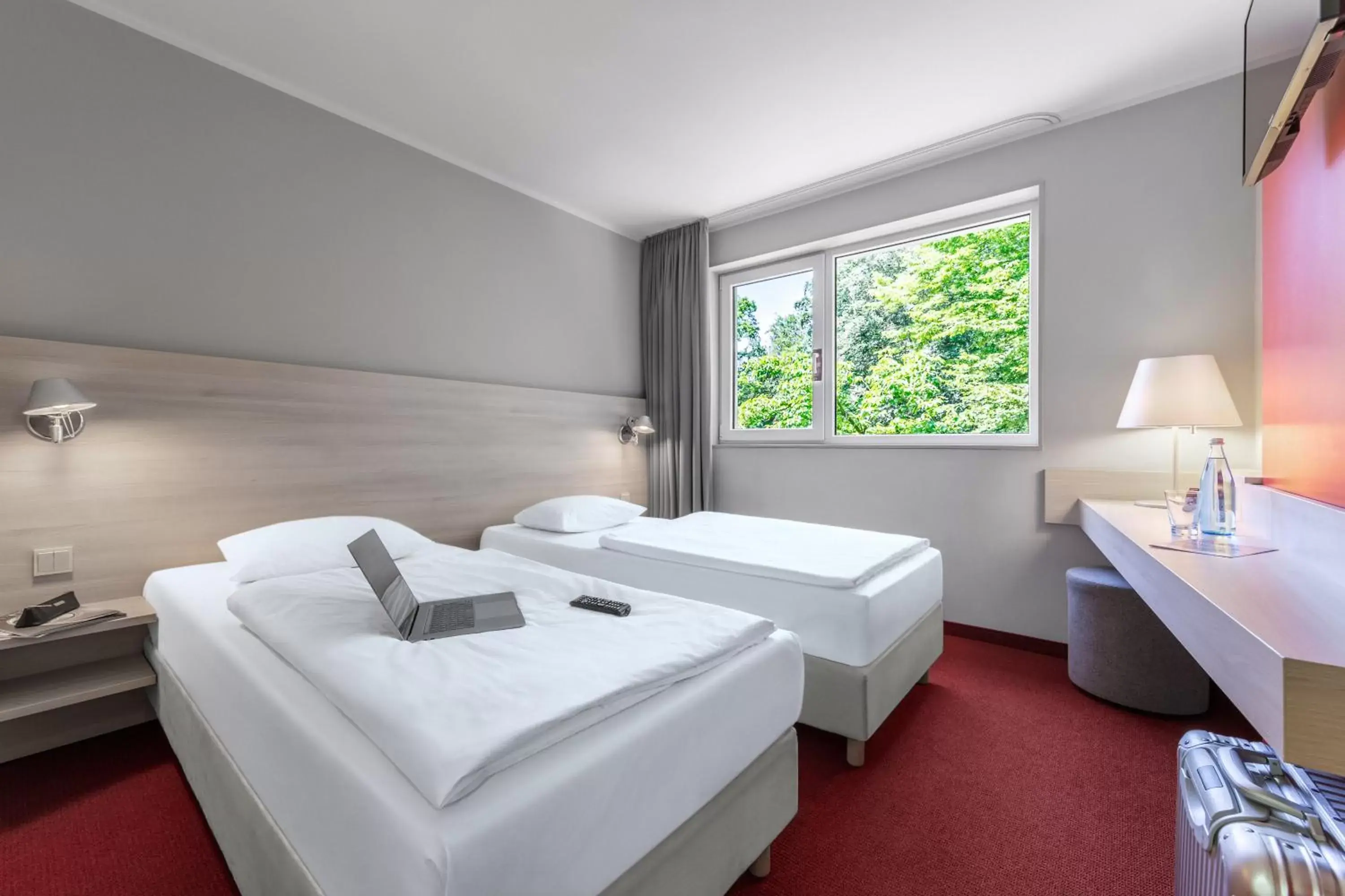 Photo of the whole room, Bed in Serways Hotel Bruchsal West
