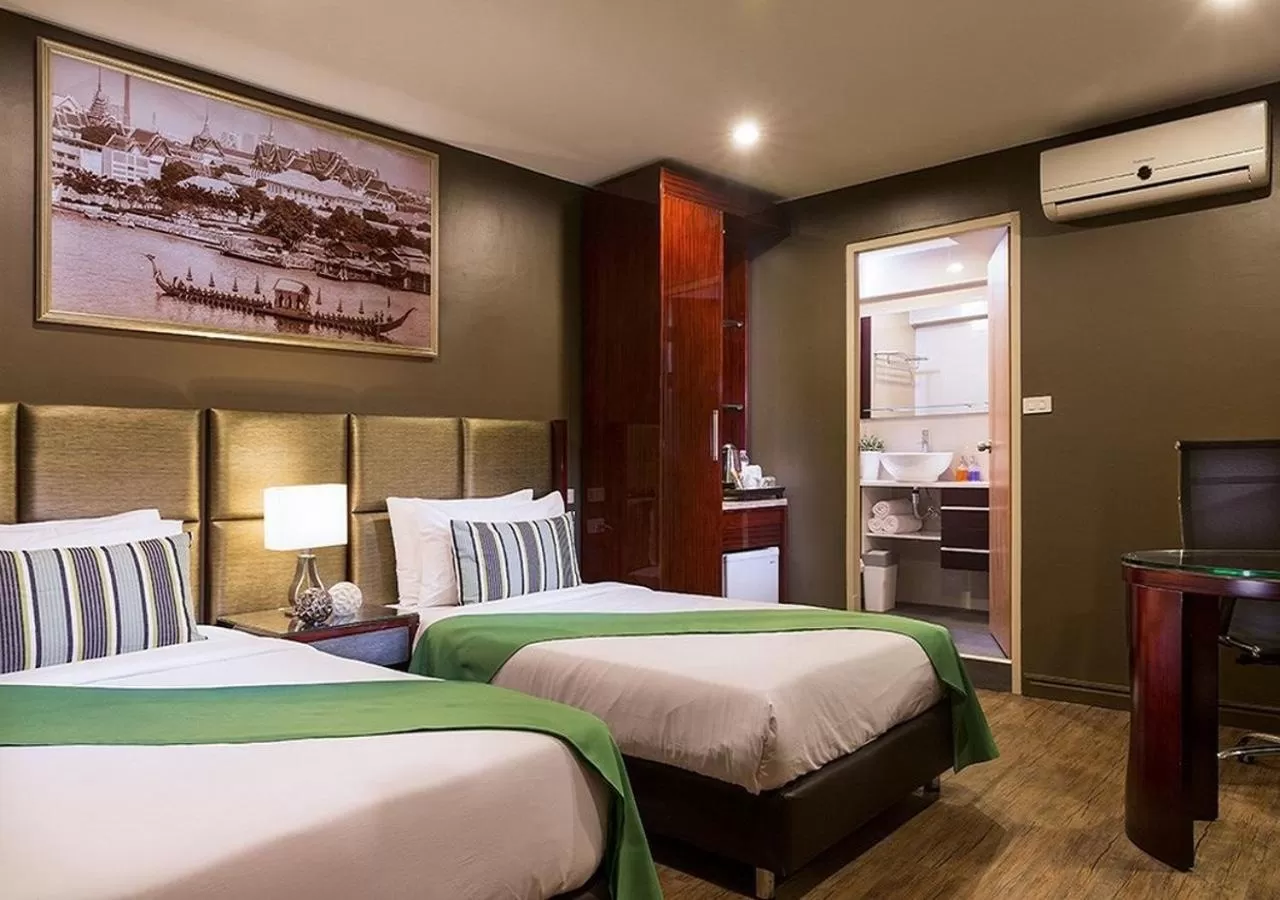 Bed in Ratchada Point Hotel