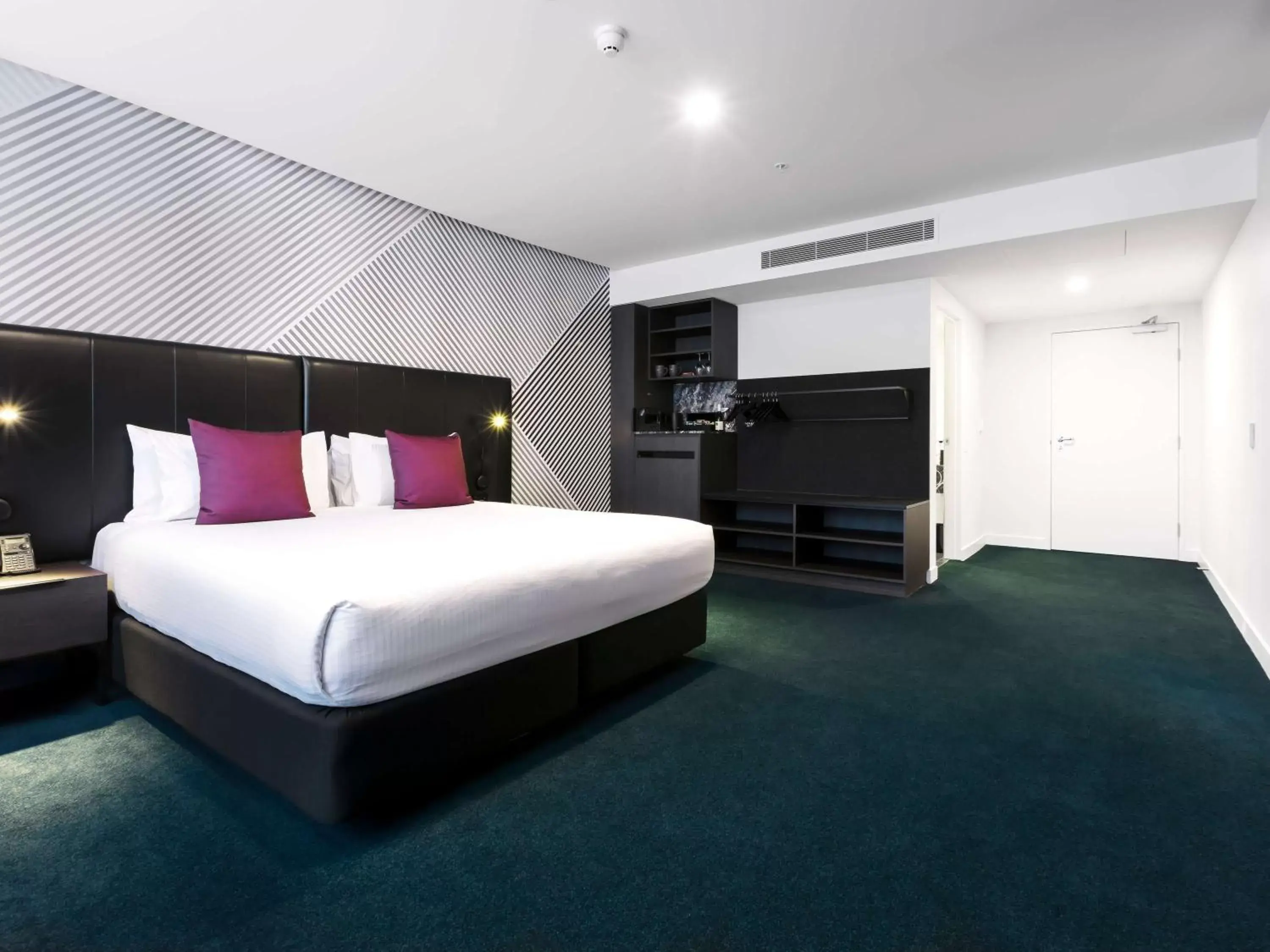 Bedroom, Bed in Movenpick Hotel Melbourne On Spencer