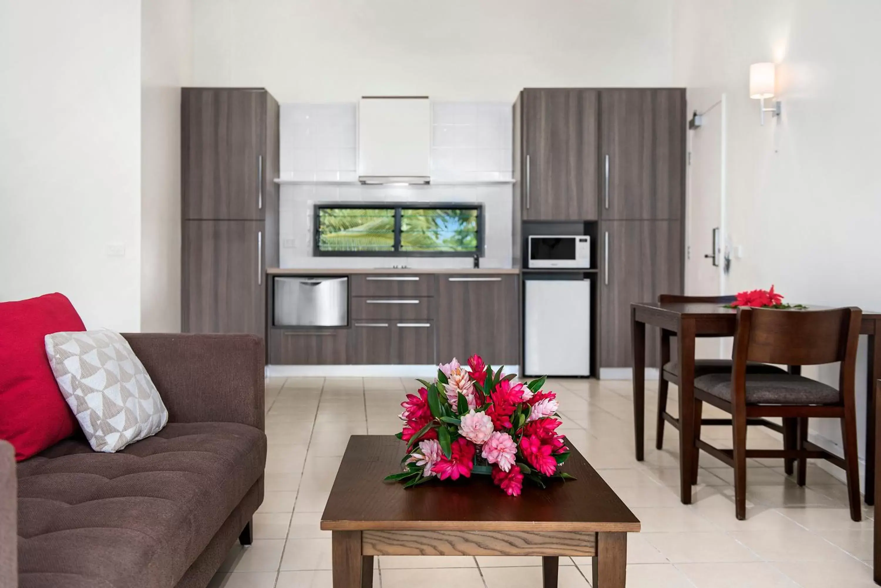 Kitchen or kitchenette, Seating Area in Iririki Island Resort & Spa
