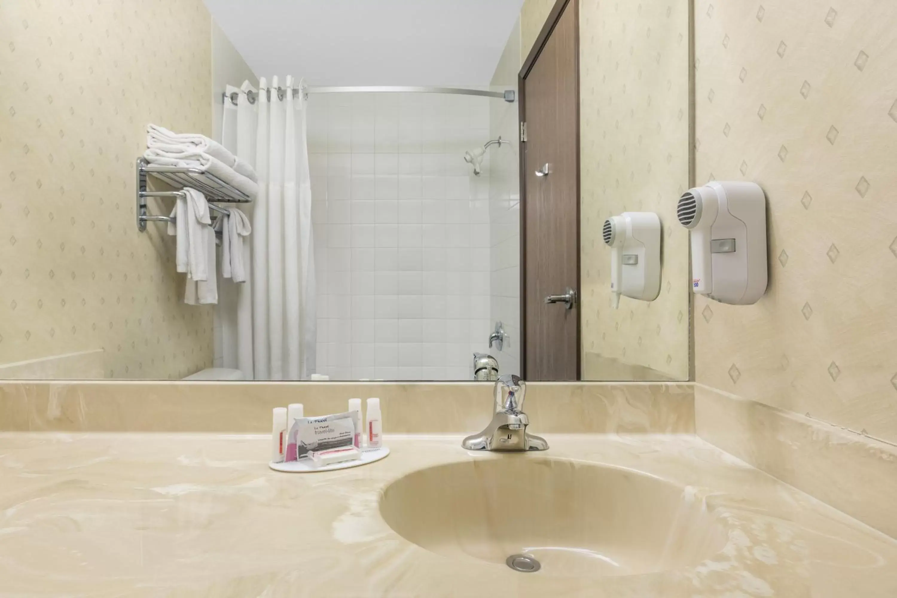 Bathroom in Ramada by Wyndham Clairmont/Grande Prairie