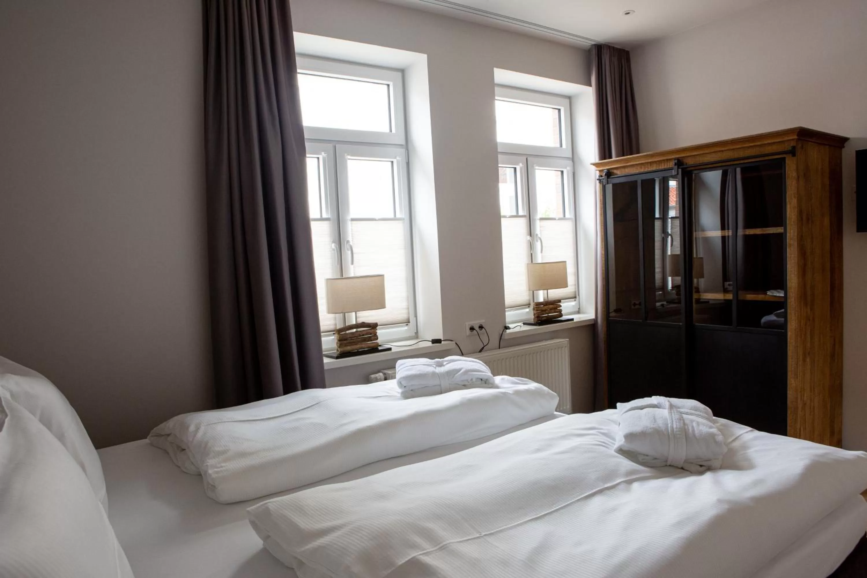 Bed in Romantik Hotel Aquarium