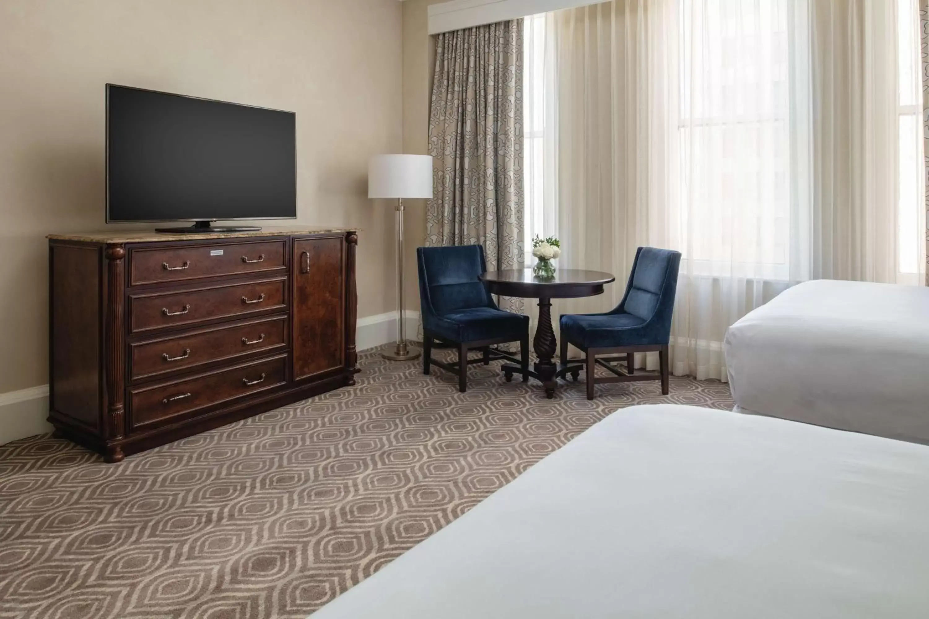 Bed, TV/Entertainment Center in The Roosevelt Hotel New Orleans - Waldorf Astoria Hotels & Resorts