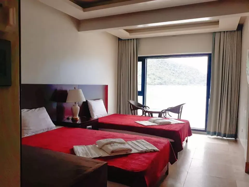 Bed in El Nido Beach Hotel