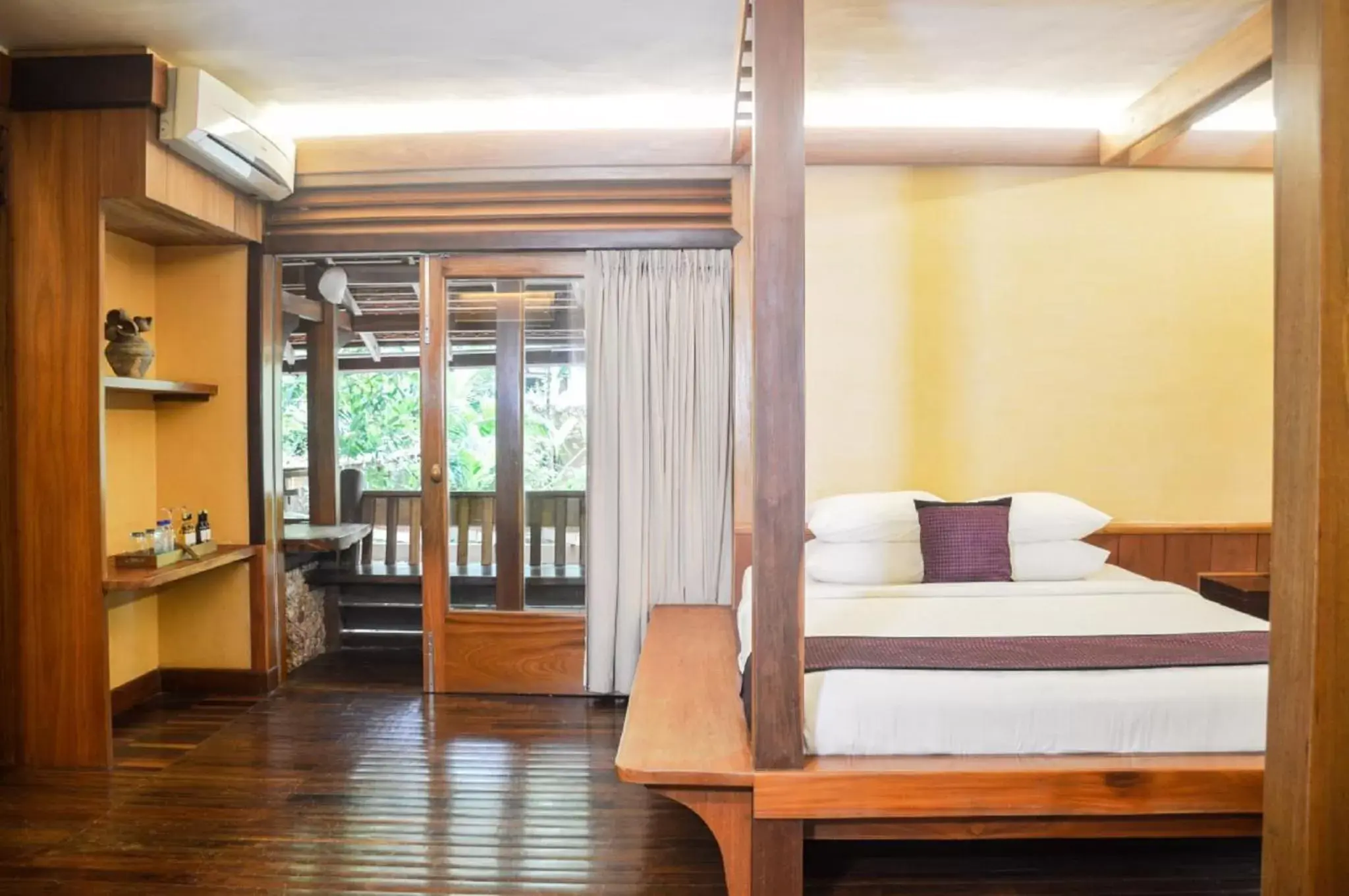 Bed in Veranda Natural Resort