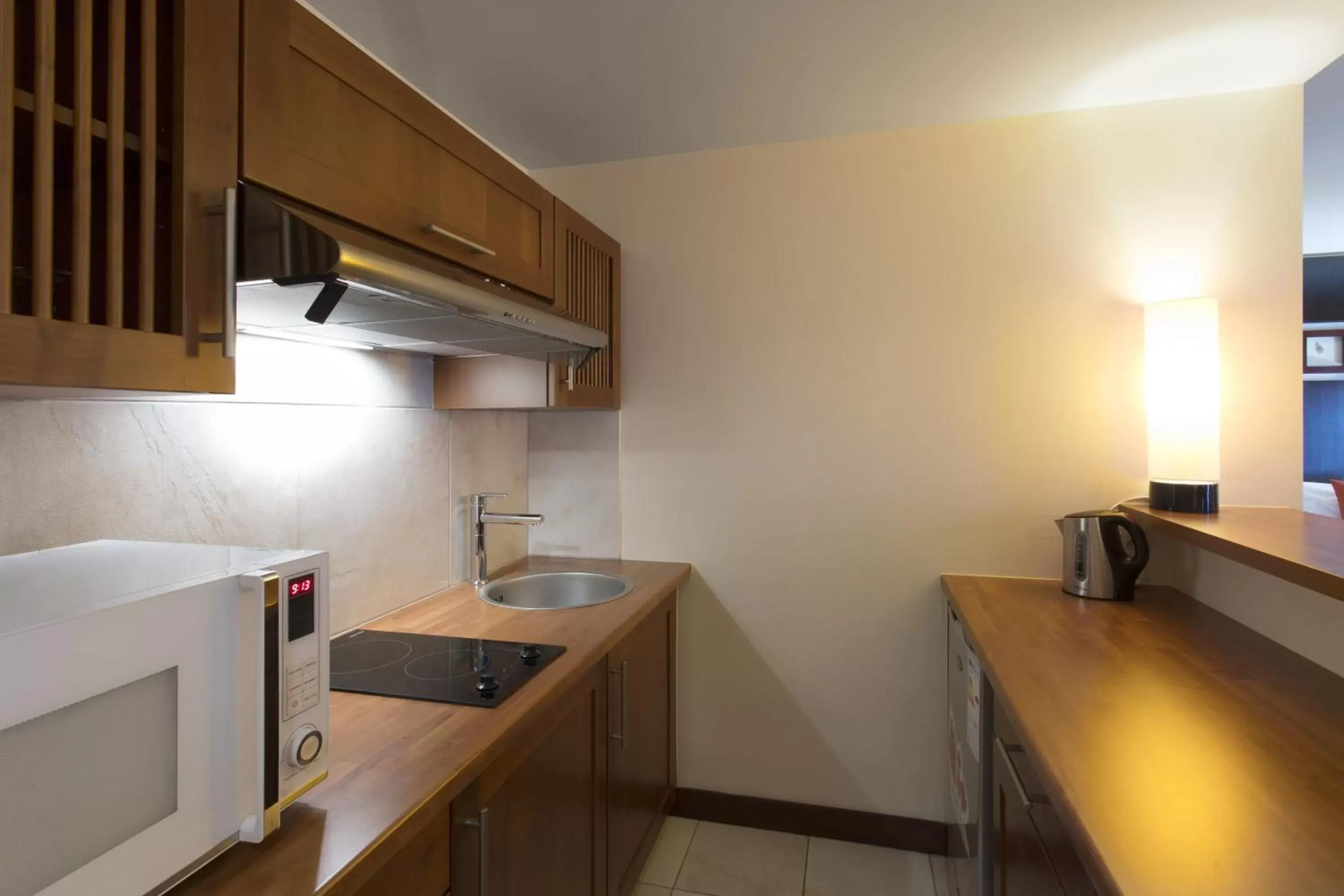 Kitchen or kitchenette, Kitchen/Kitchenette in Ramada Hotel & Suites by Wyndham Noumea