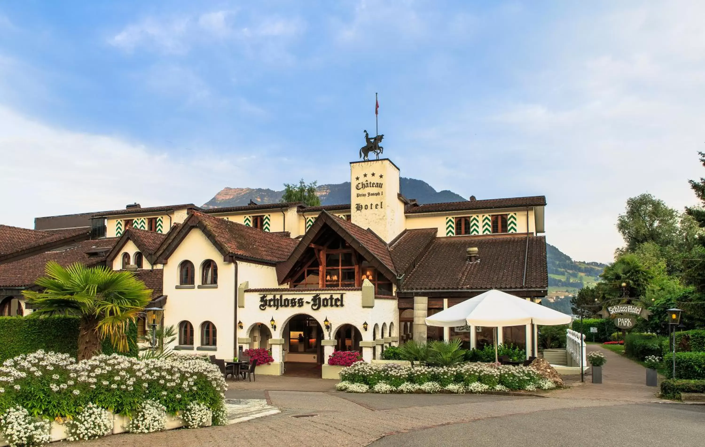 Facade/entrance in Swiss-Chalet Merlischachen - Romantik Schloss-Hotel am See