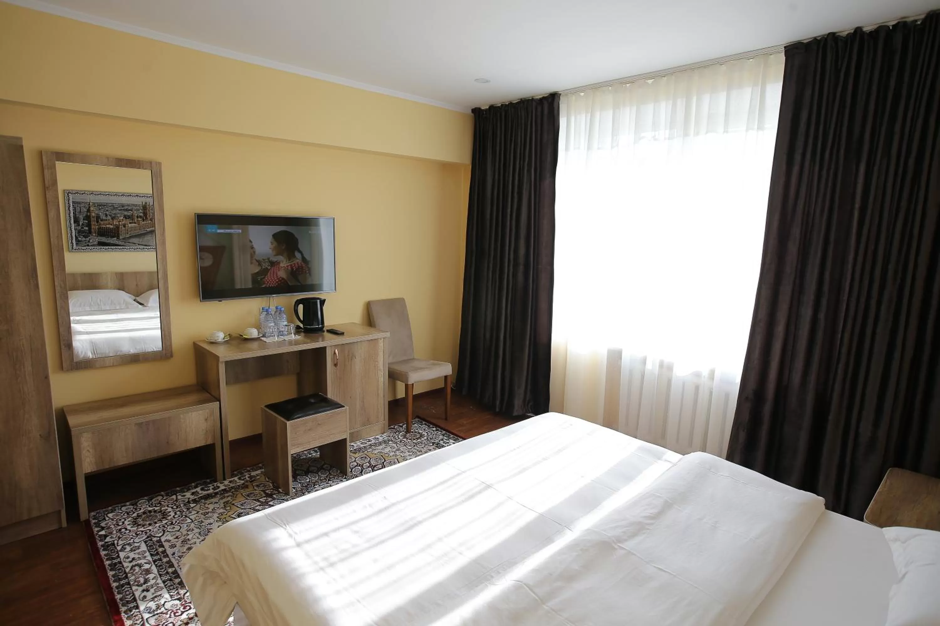 Bed in Altai Business Hotel