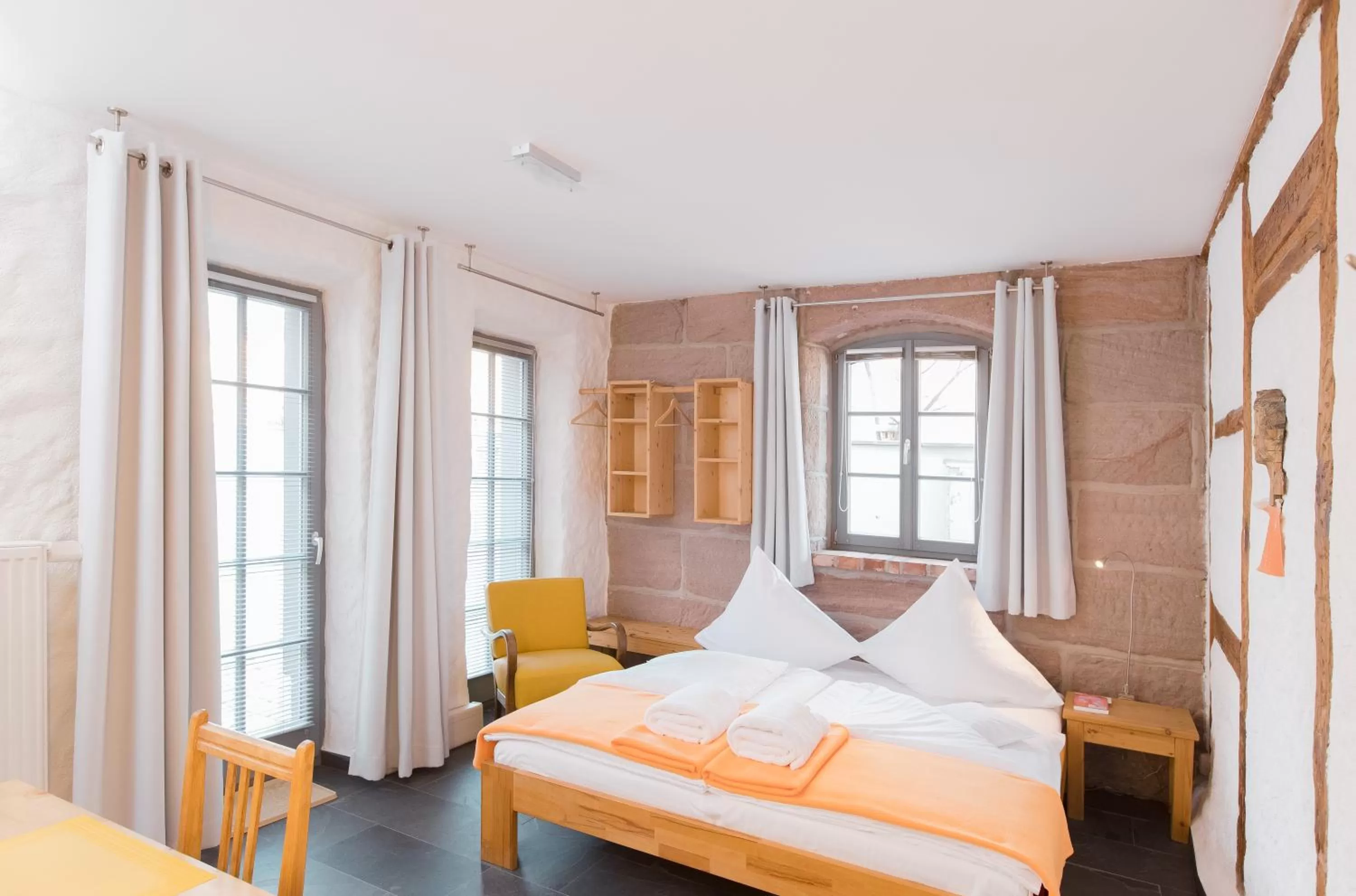 Photo of the whole room, Bed in Biohotel Kunstquartier