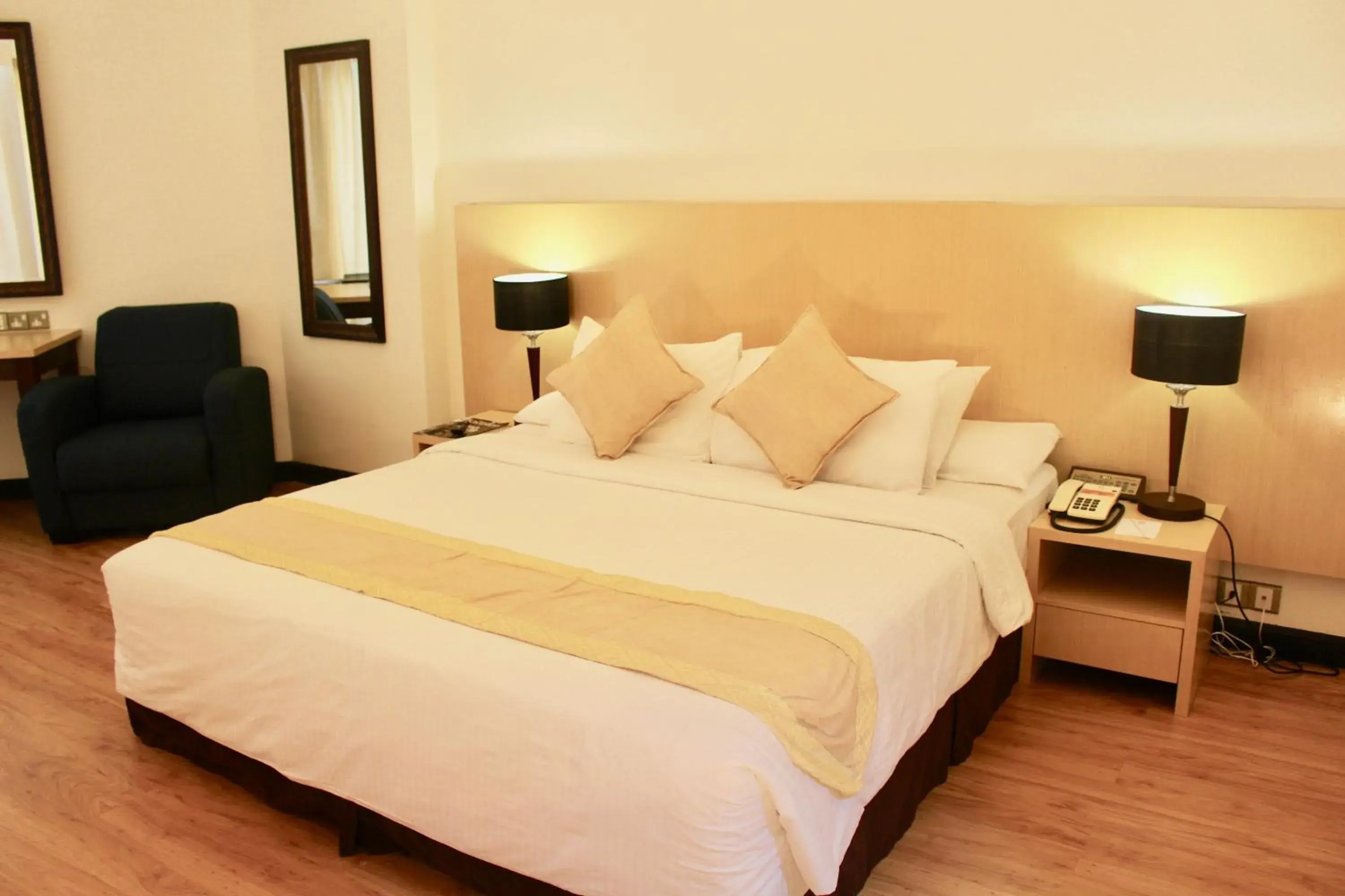 Bed in Primula Beach Hotel