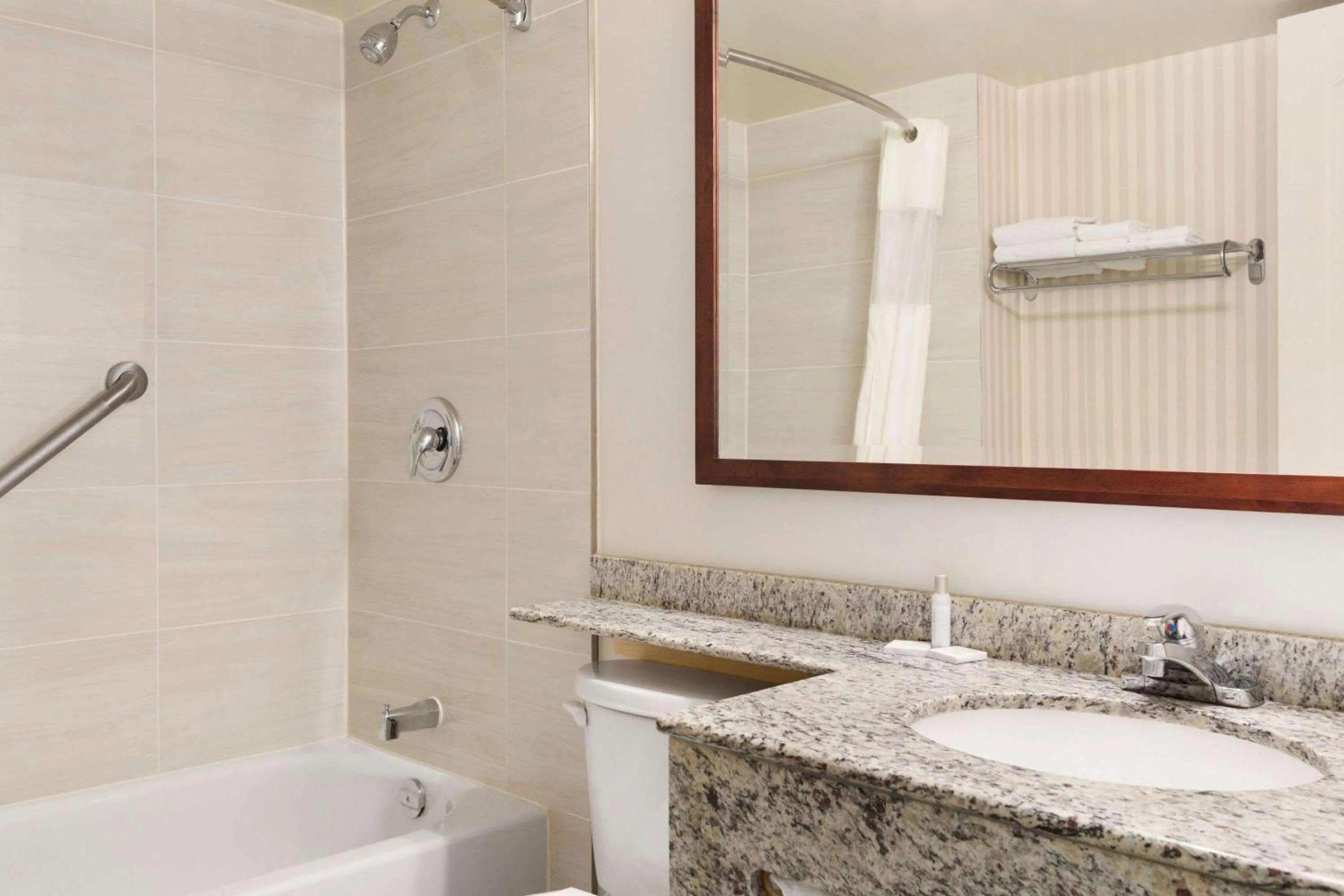 Bathroom in Travelodge by Wyndham Owen Sound ON