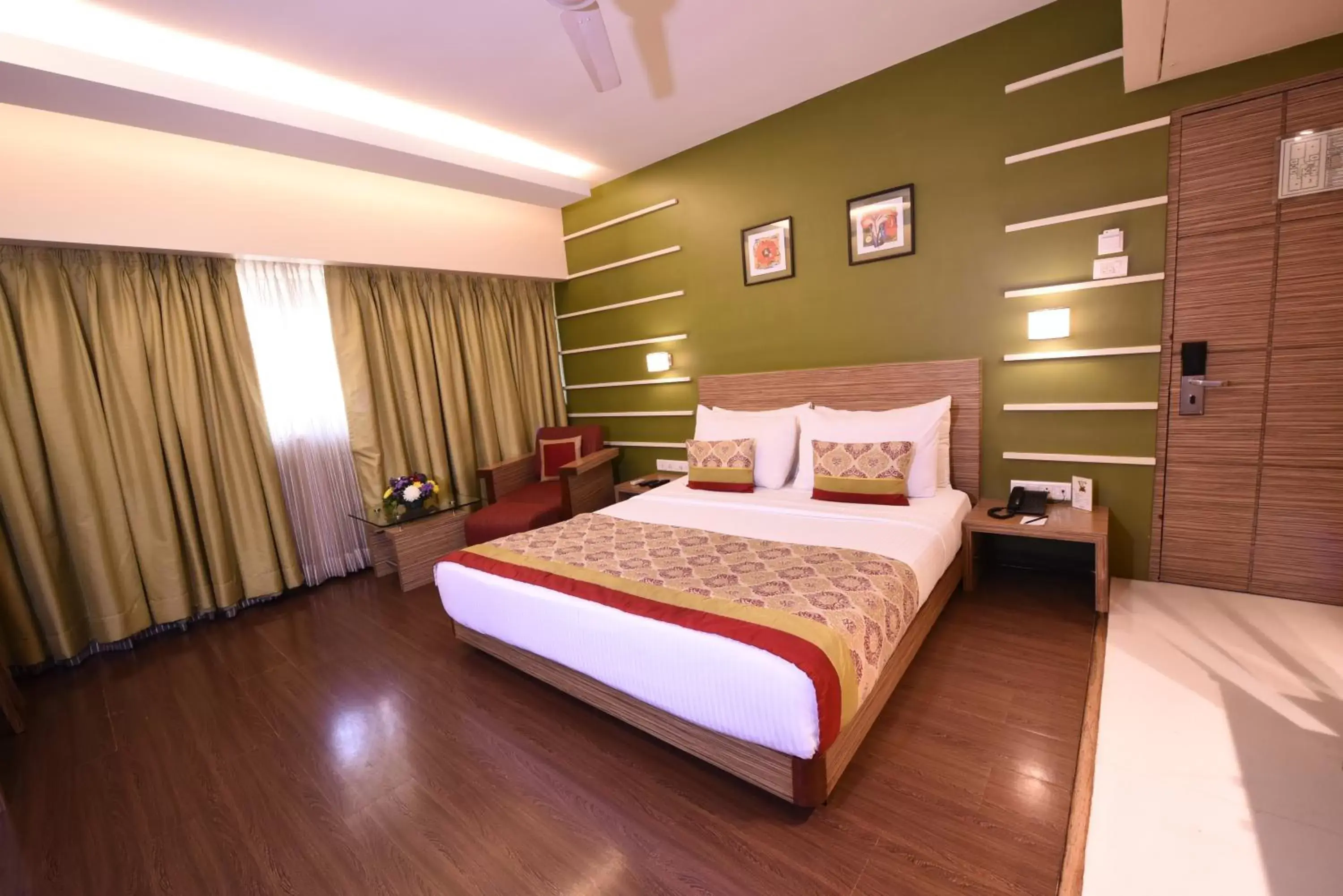 Bed in Hotel Bawa Suites