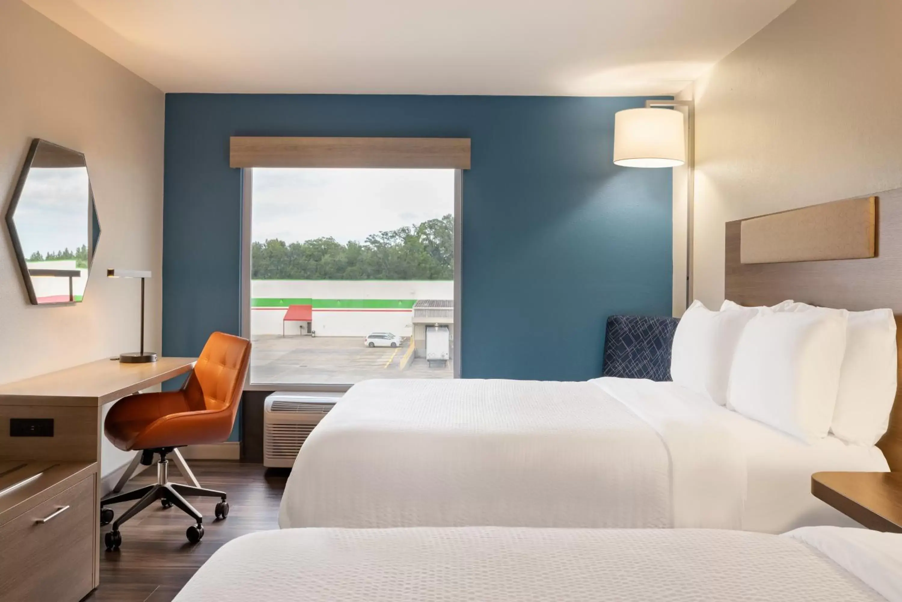 Bedroom in Holiday Inn Express & Suites Opelousas, an IHG Hotel