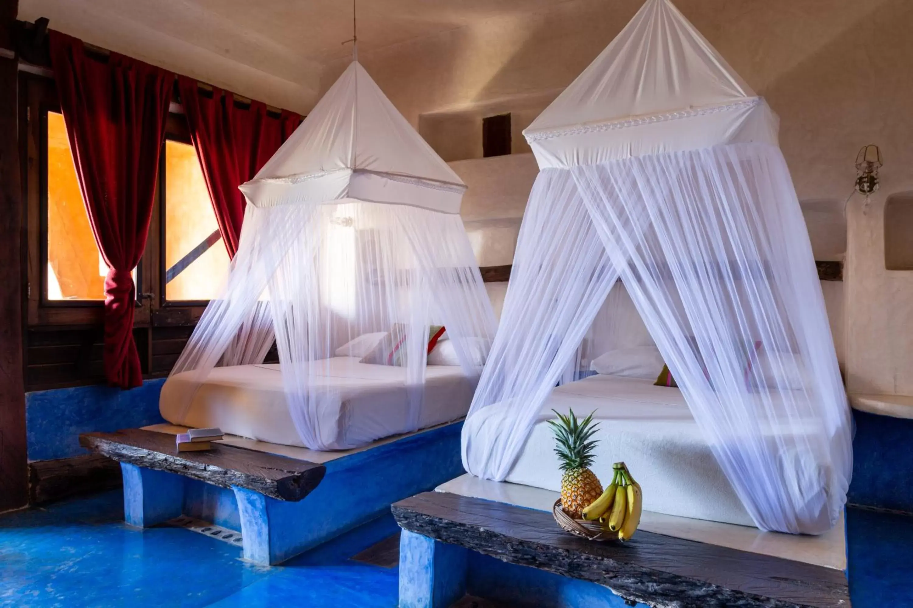 Room with Partial Ocean View two double beds in La Posada del Sol Boutique Hotel Tulum