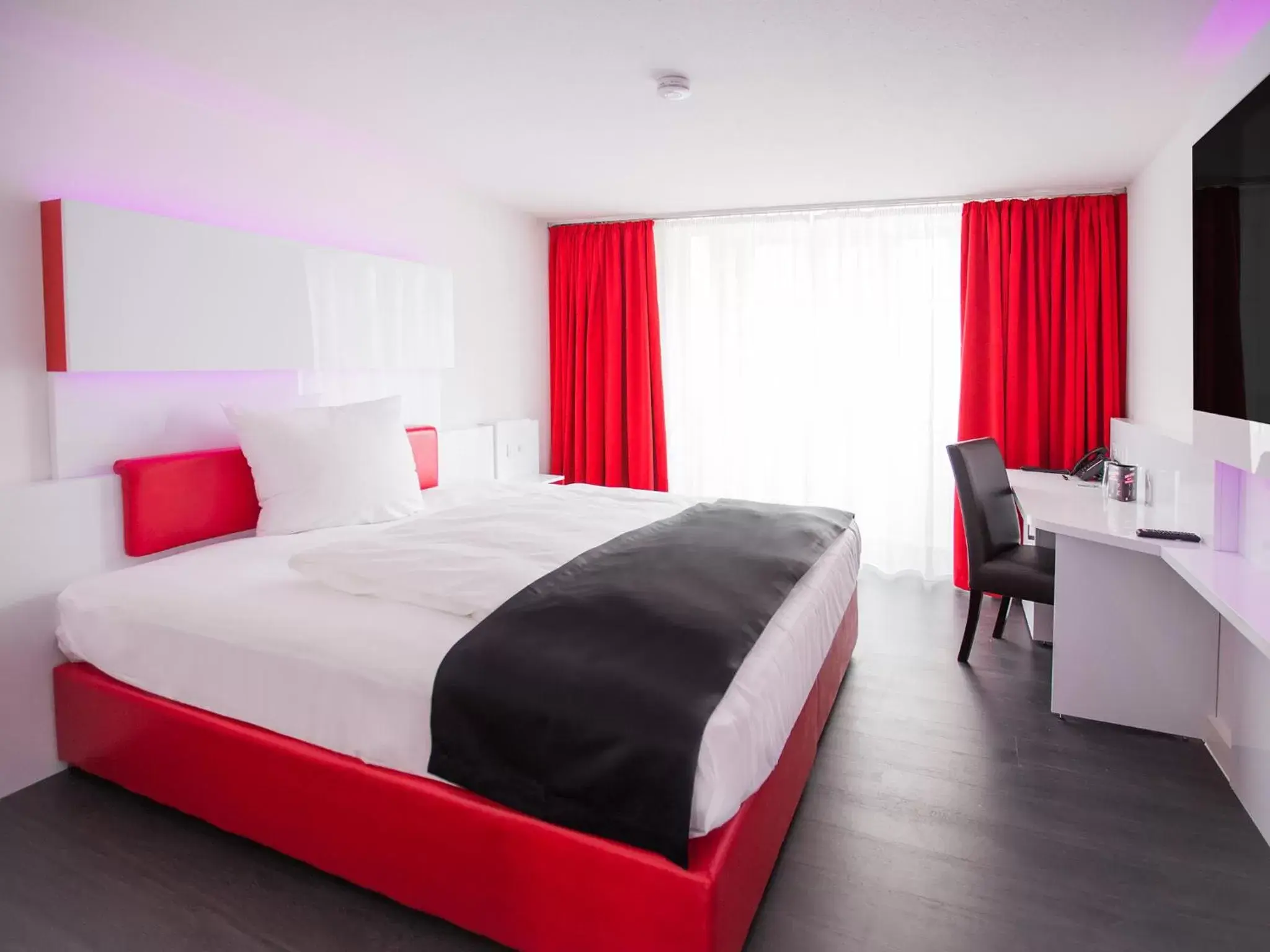 Photo of the whole room, Bed in DORMERO Hotel Villingen-Schwenningen