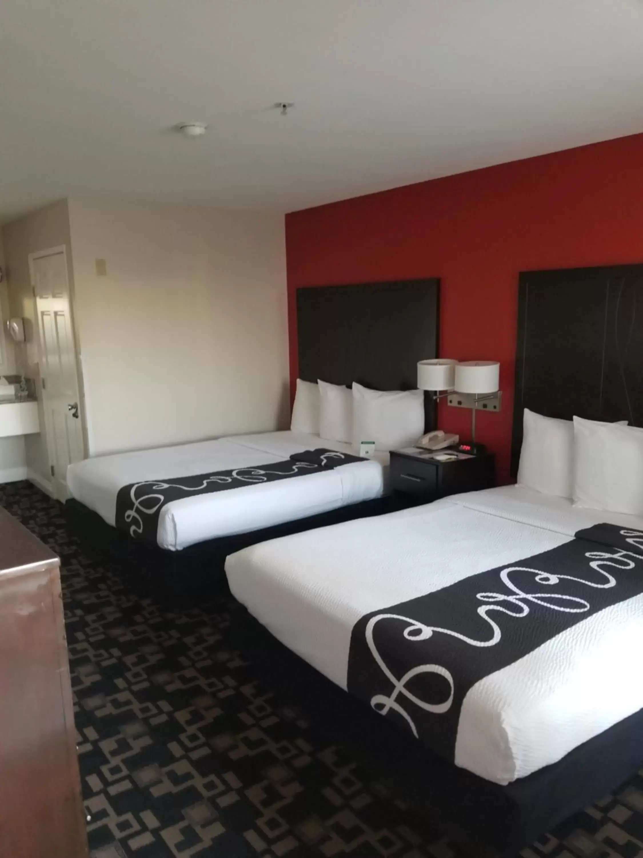 Bed in Ramada by Wyndham Oceanside