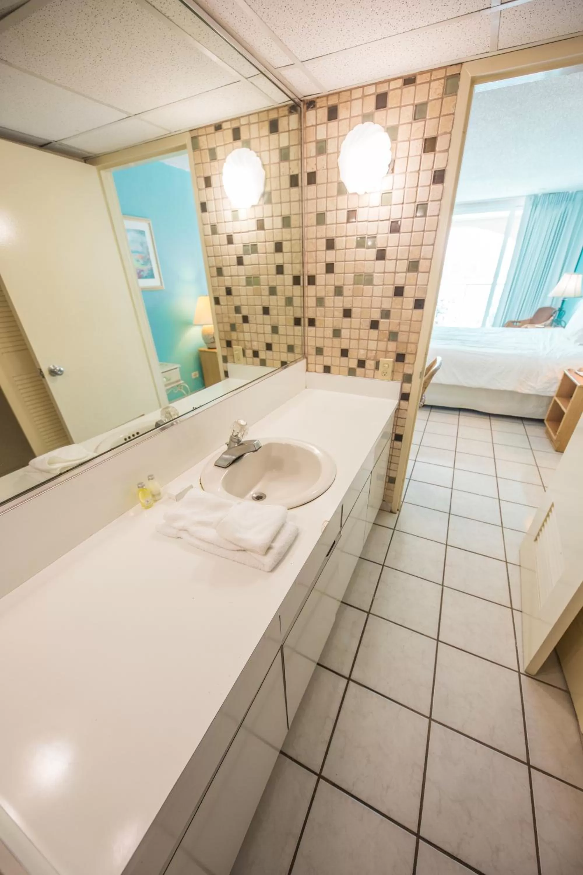 Bathroom in ESJ Towers by Chana