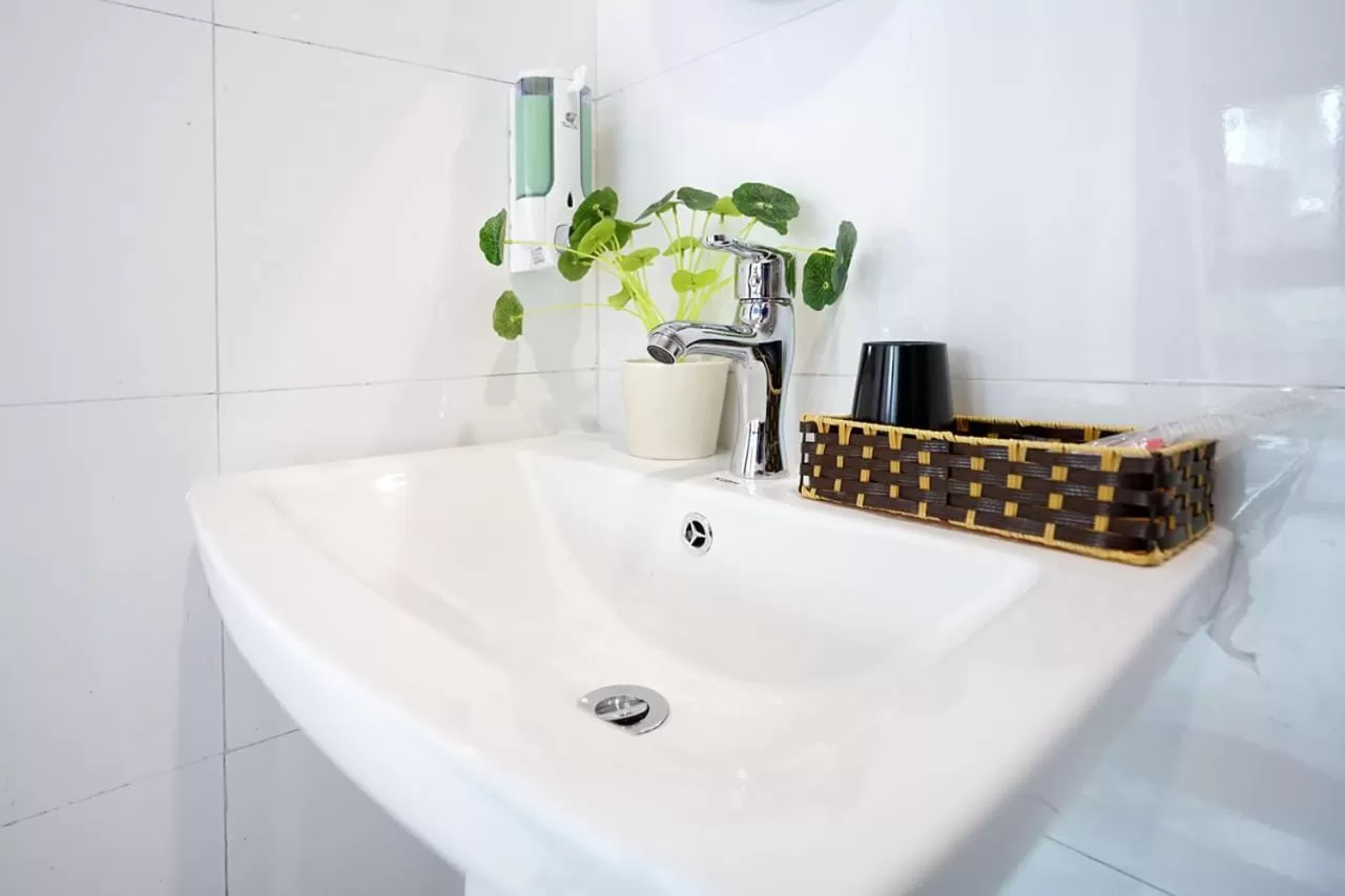 Bathroom in Almor Hostel With Pool in right center