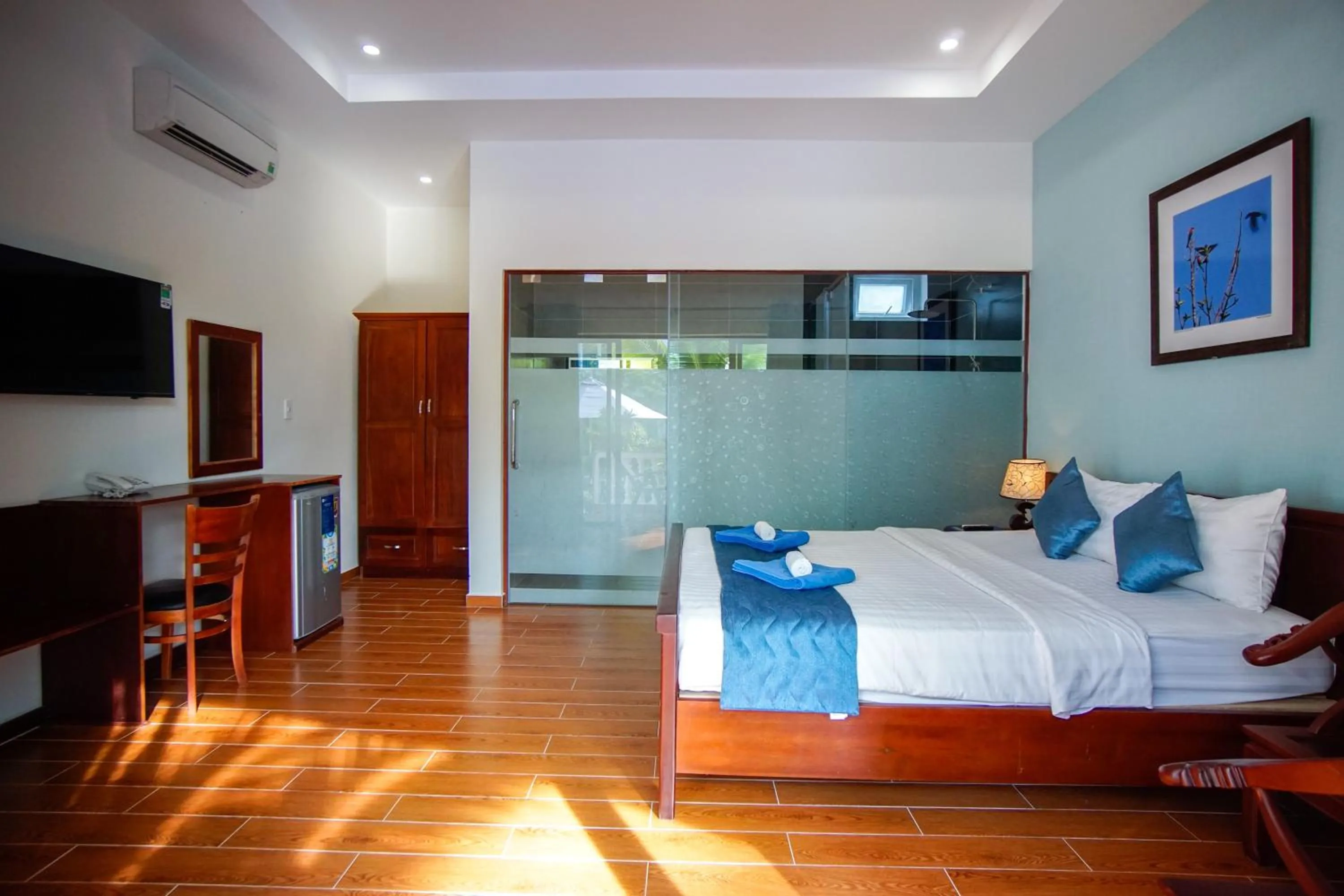 Communal lounge/ TV room, Bed in Brenta Phu Quoc Hotel