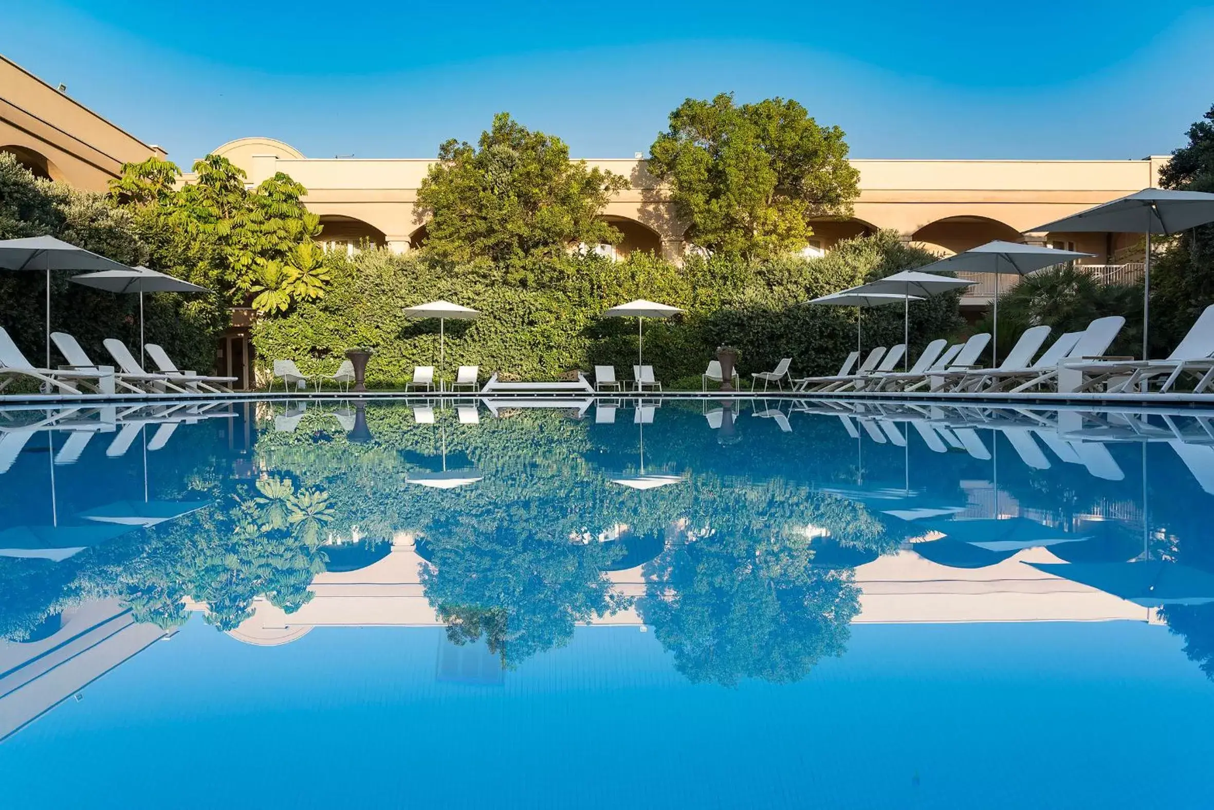 Swimming Pool in Romano Palace Luxury Hotel