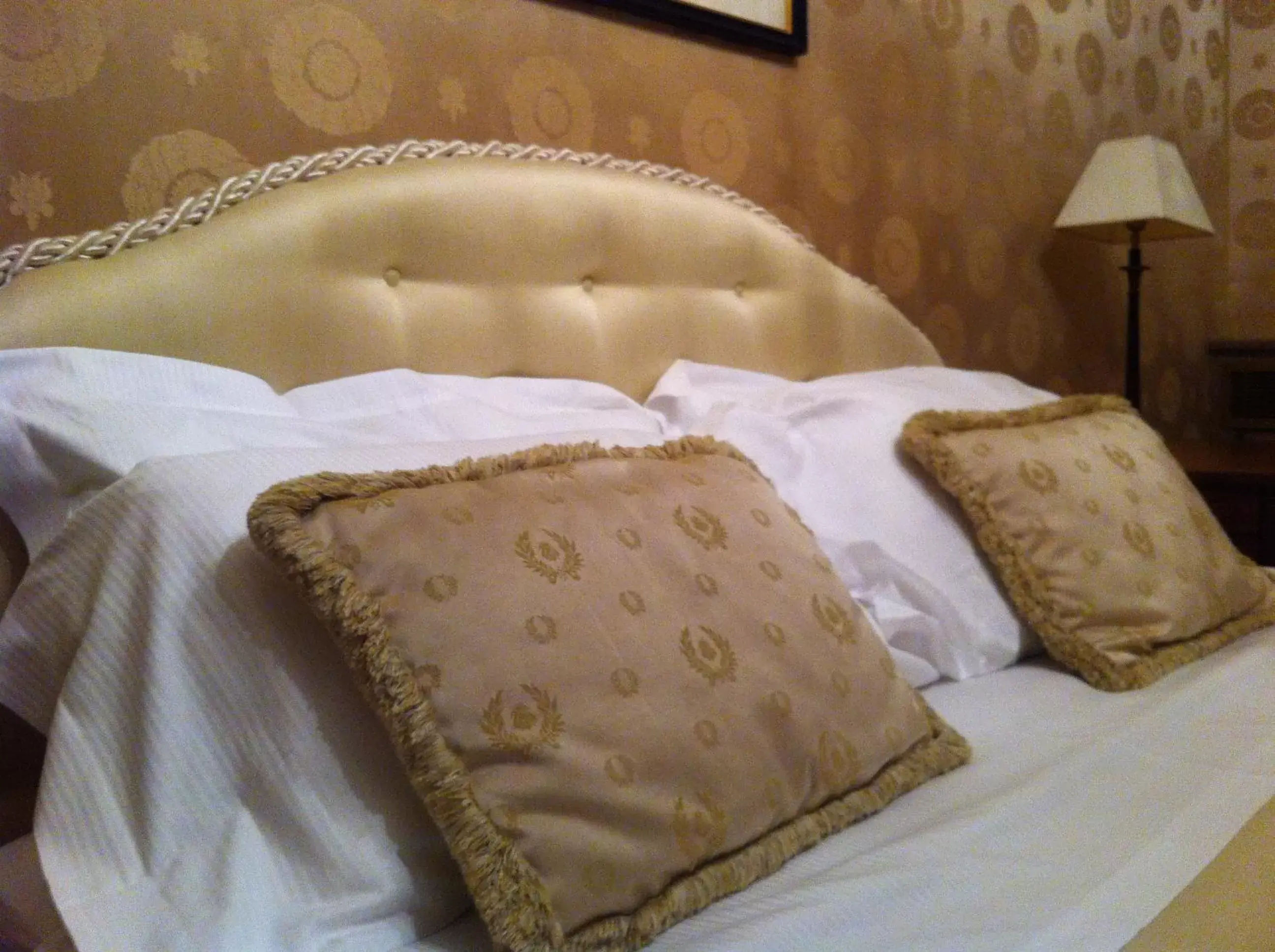 Decorative detail, Bed in Albergo Cappello