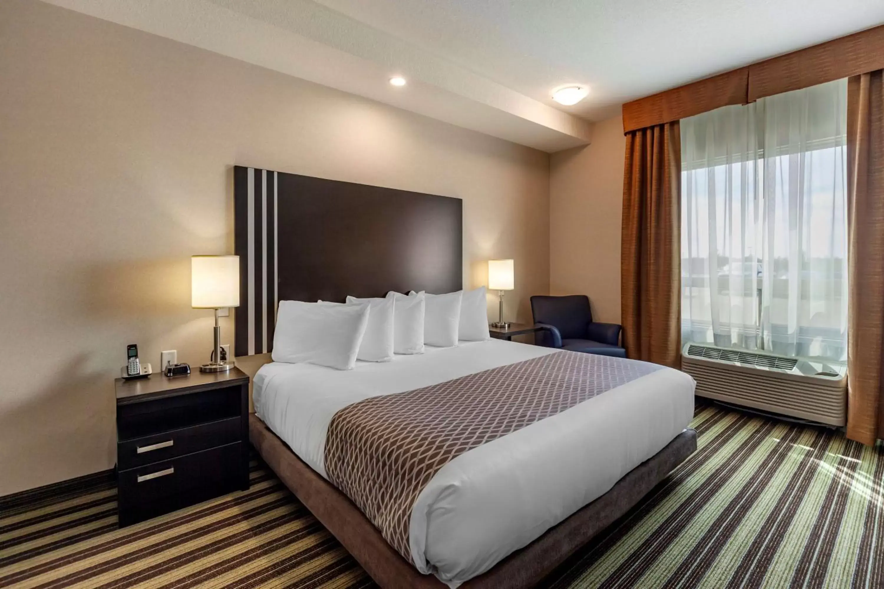 Bedroom, Bed in Best Western Plus Drayton Valley All Suites