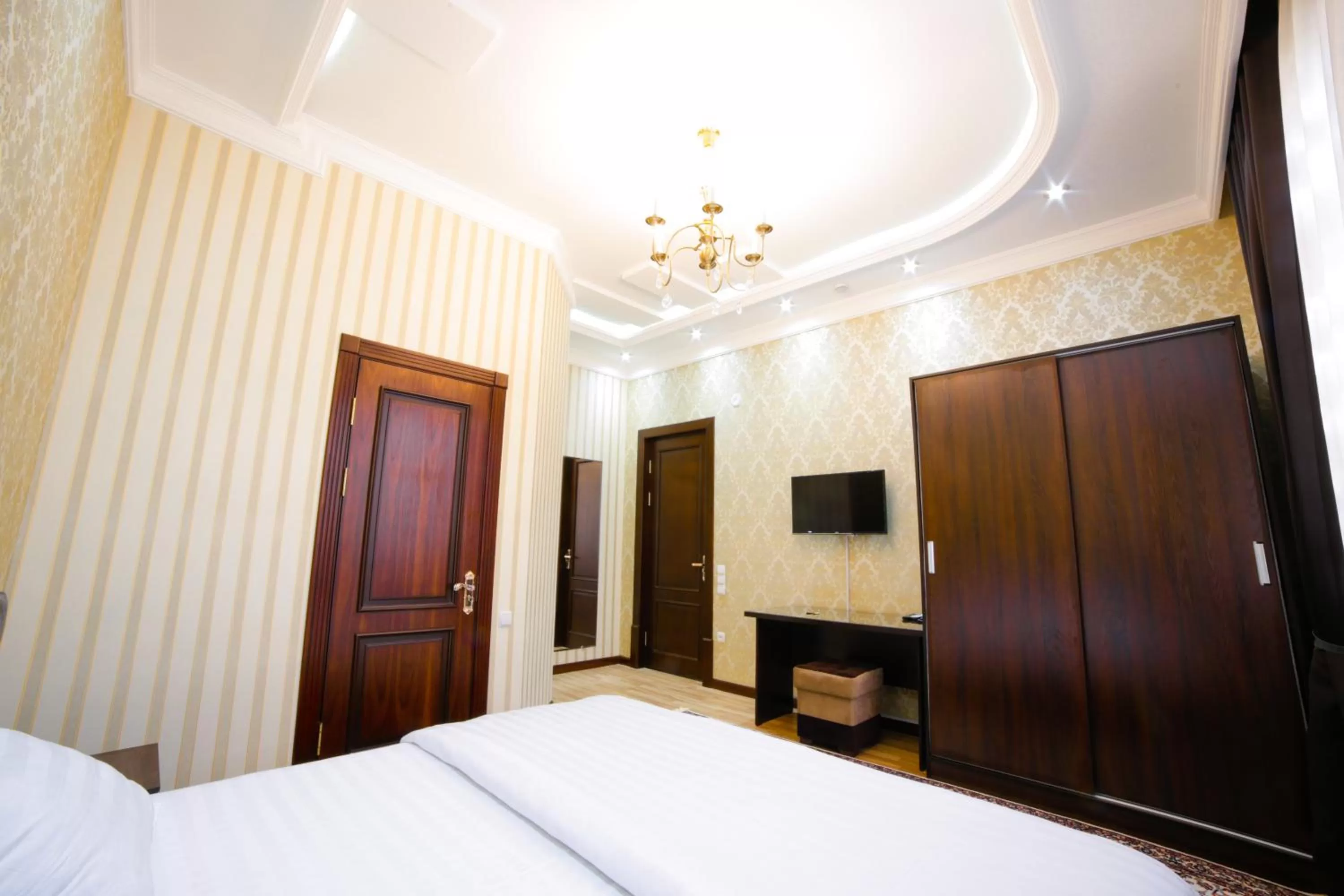 TV and multimedia, Bed in Alliance Hotel Tashkent