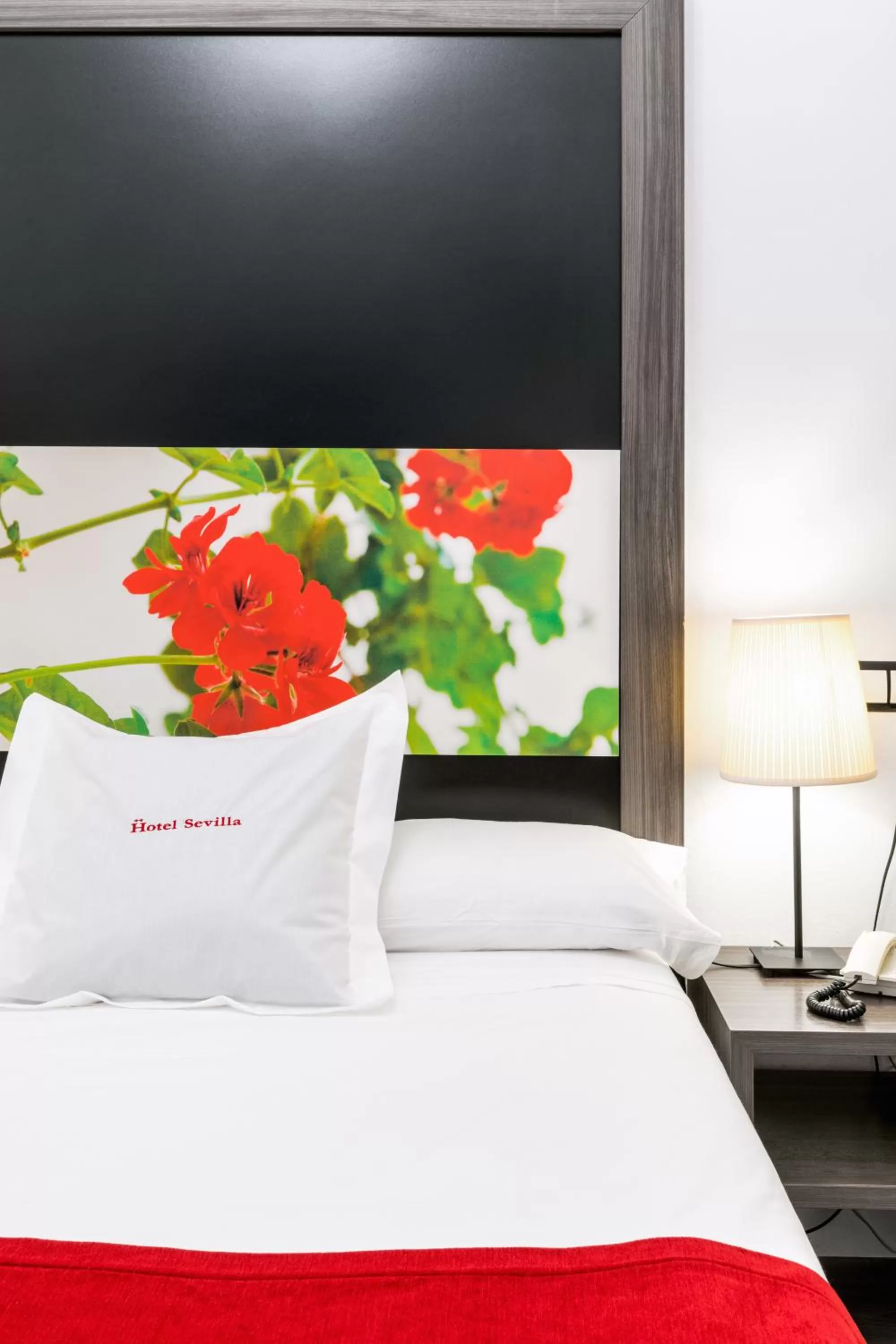 Bed in Hotel Sevilla