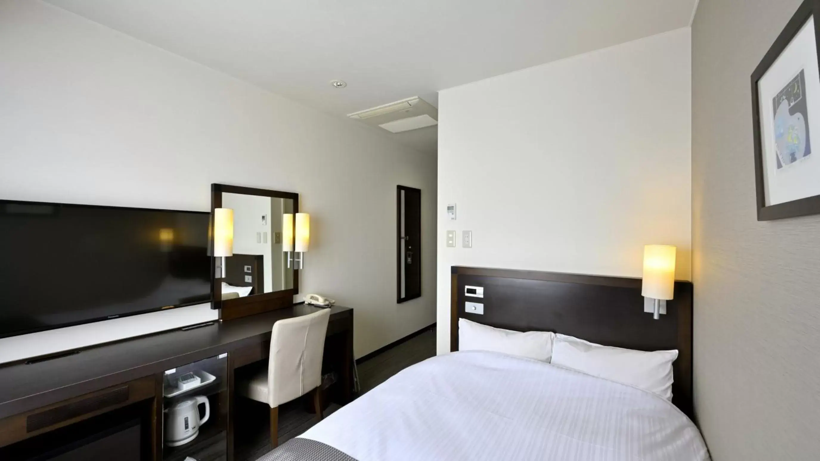 Bed in Saijo Urban Hotel