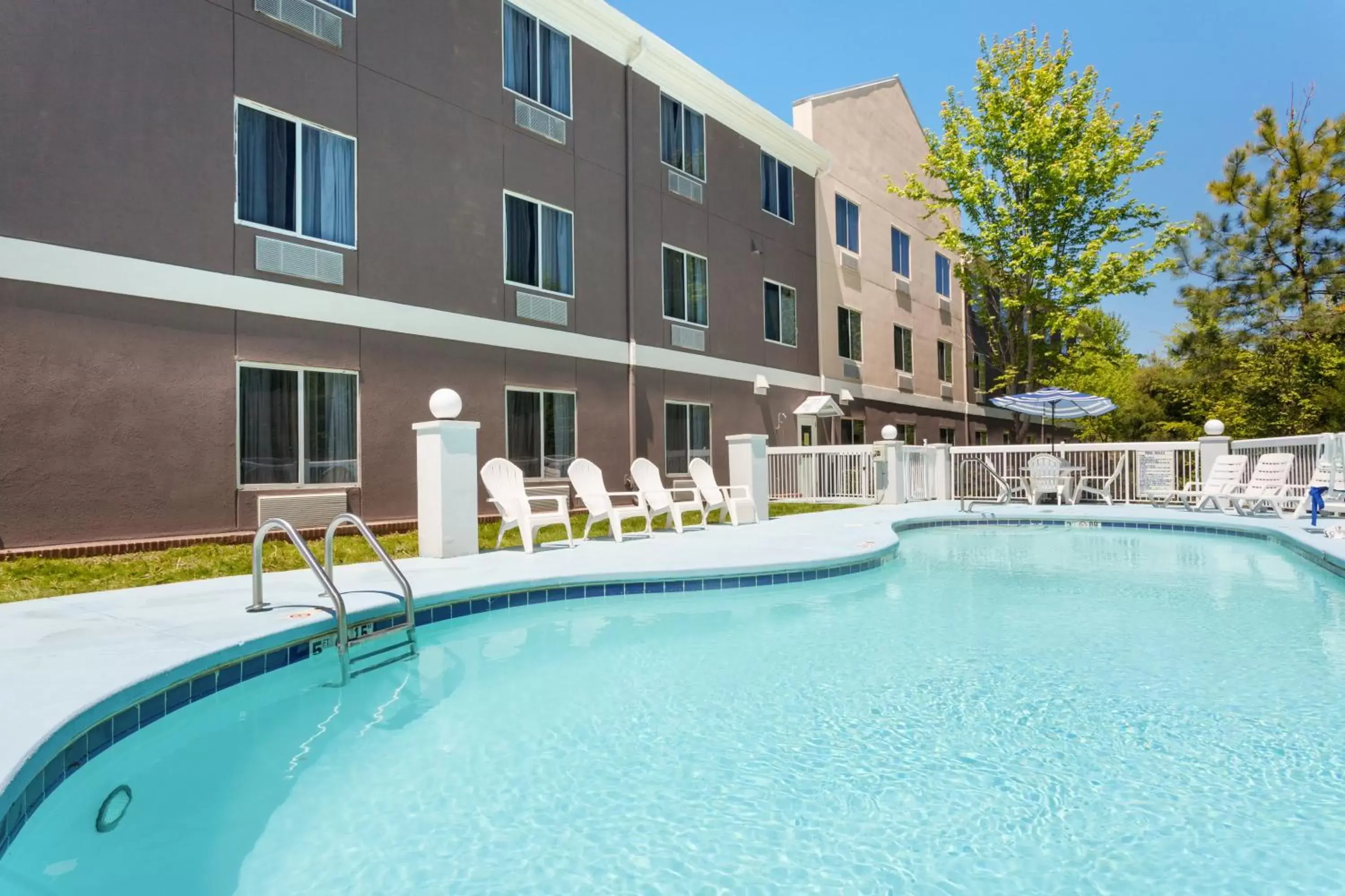 Swimming pool, Property Building in Holiday Inn Express Hotel & Suites Mebane, an IHG Hotel