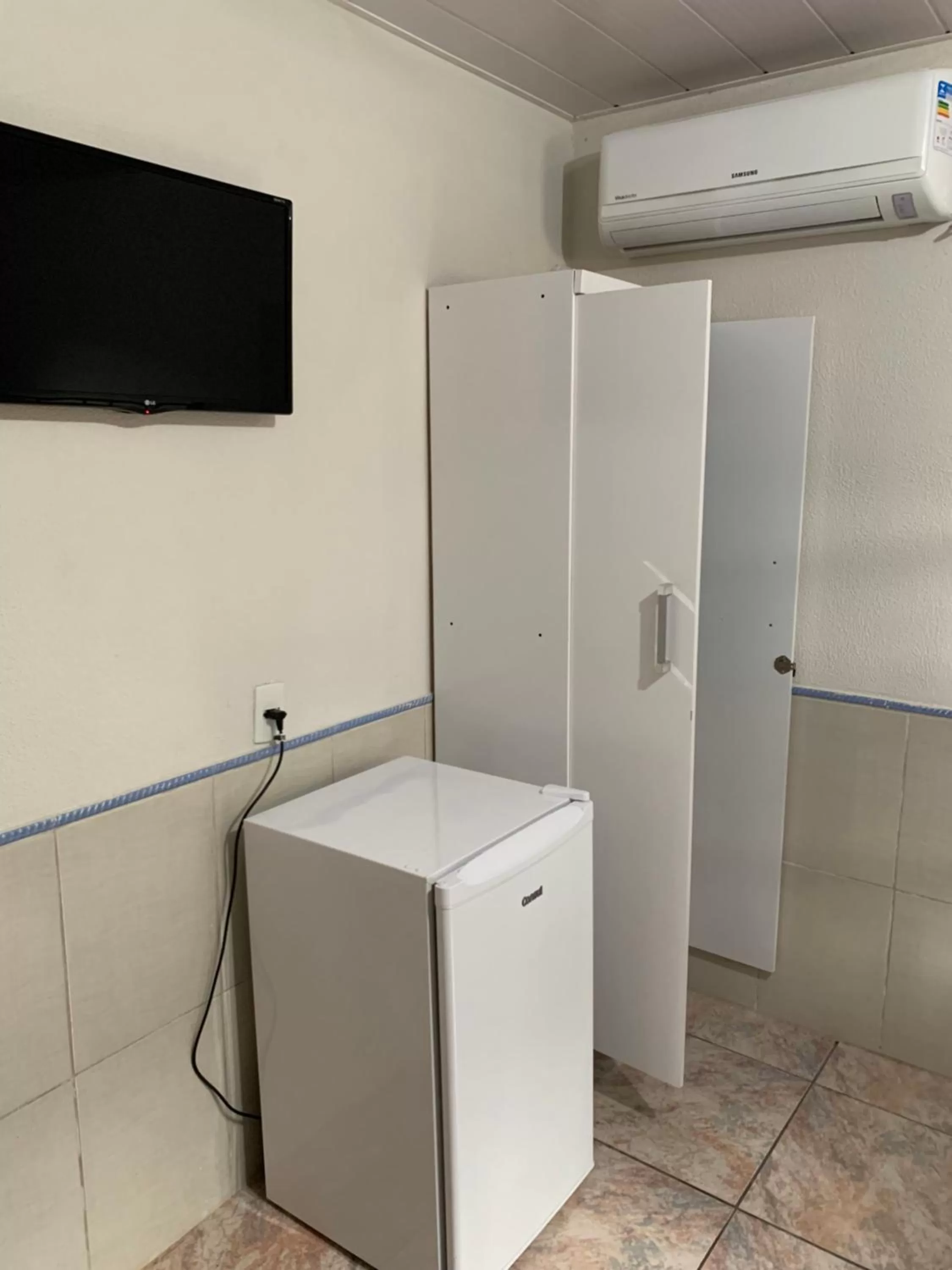 TV and multimedia, Bathroom in Pousada Tio Tonho