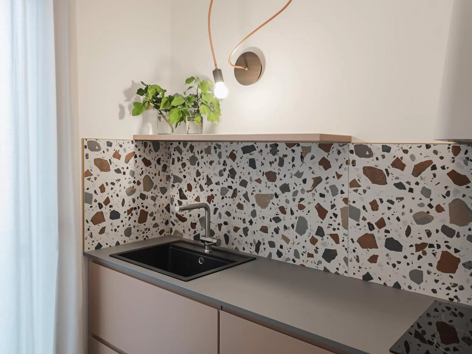 Kitchen or kitchenette in Living u HomeSuites