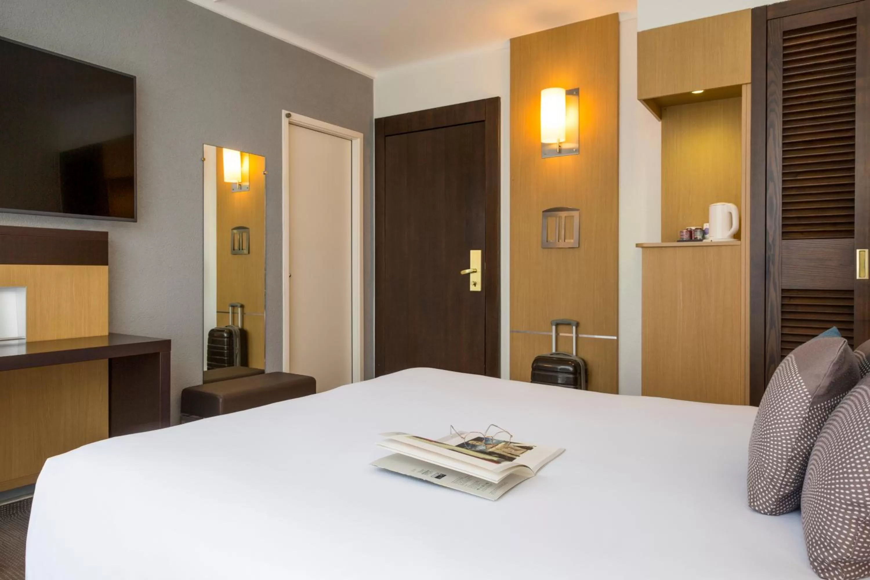 Bed in Novotel Genève Centre