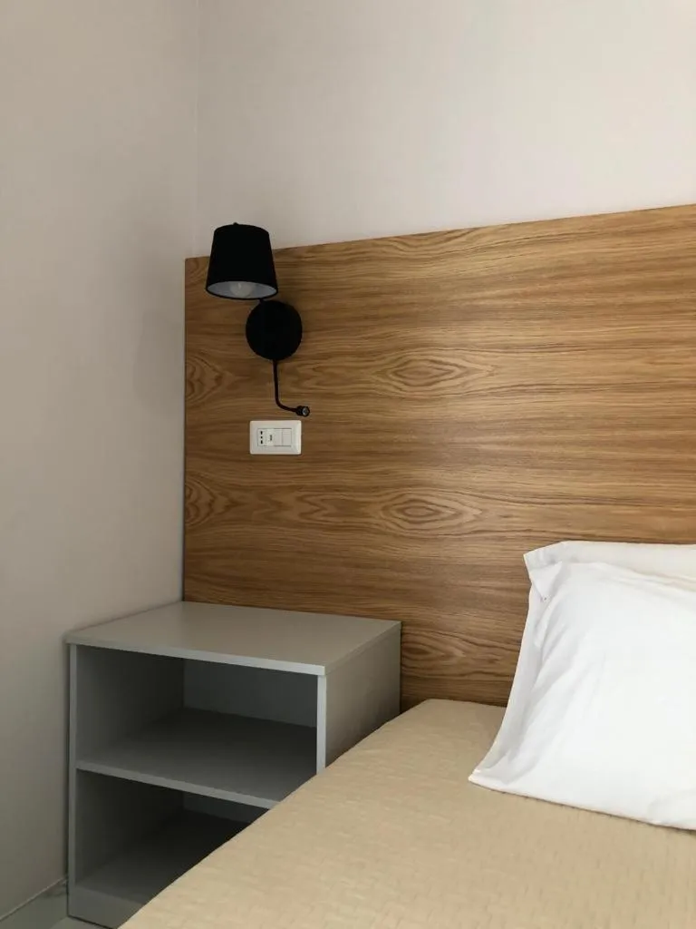 Bed in Albergo Milazzo Inn AiMori