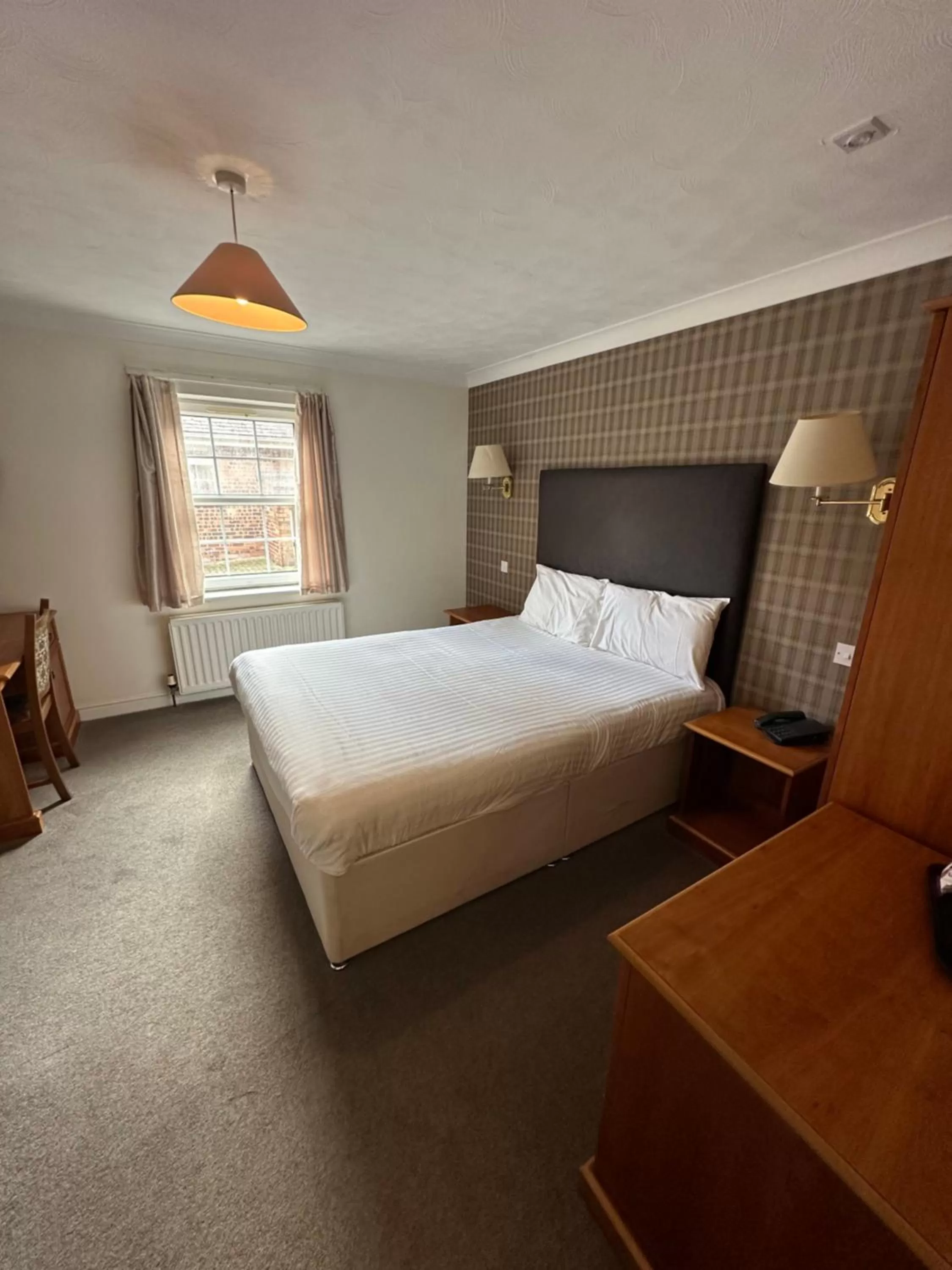 Bedroom in The Gables Hotel