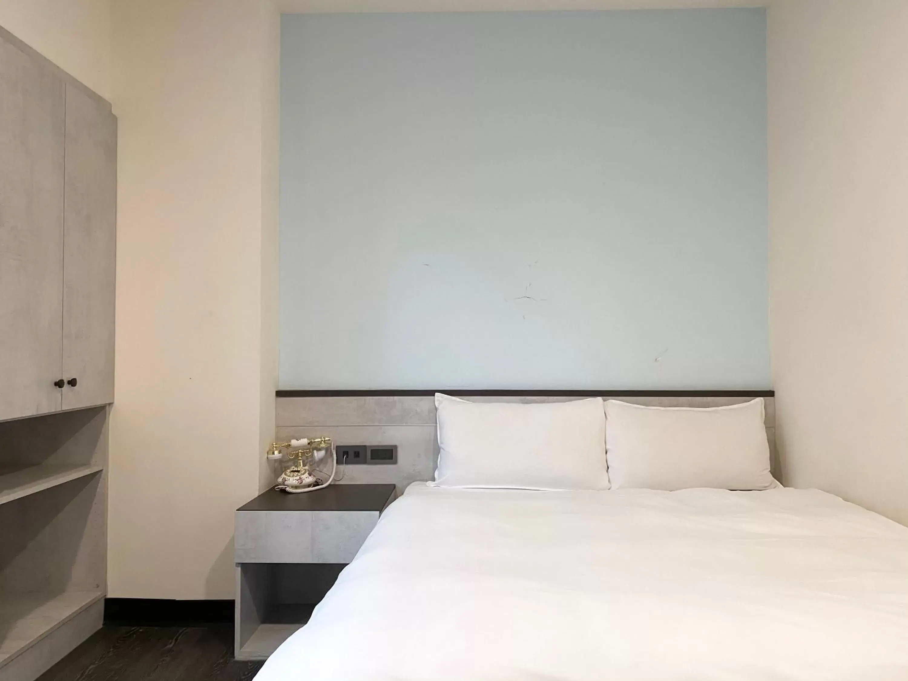 Bed in Raise Hotel Taichung