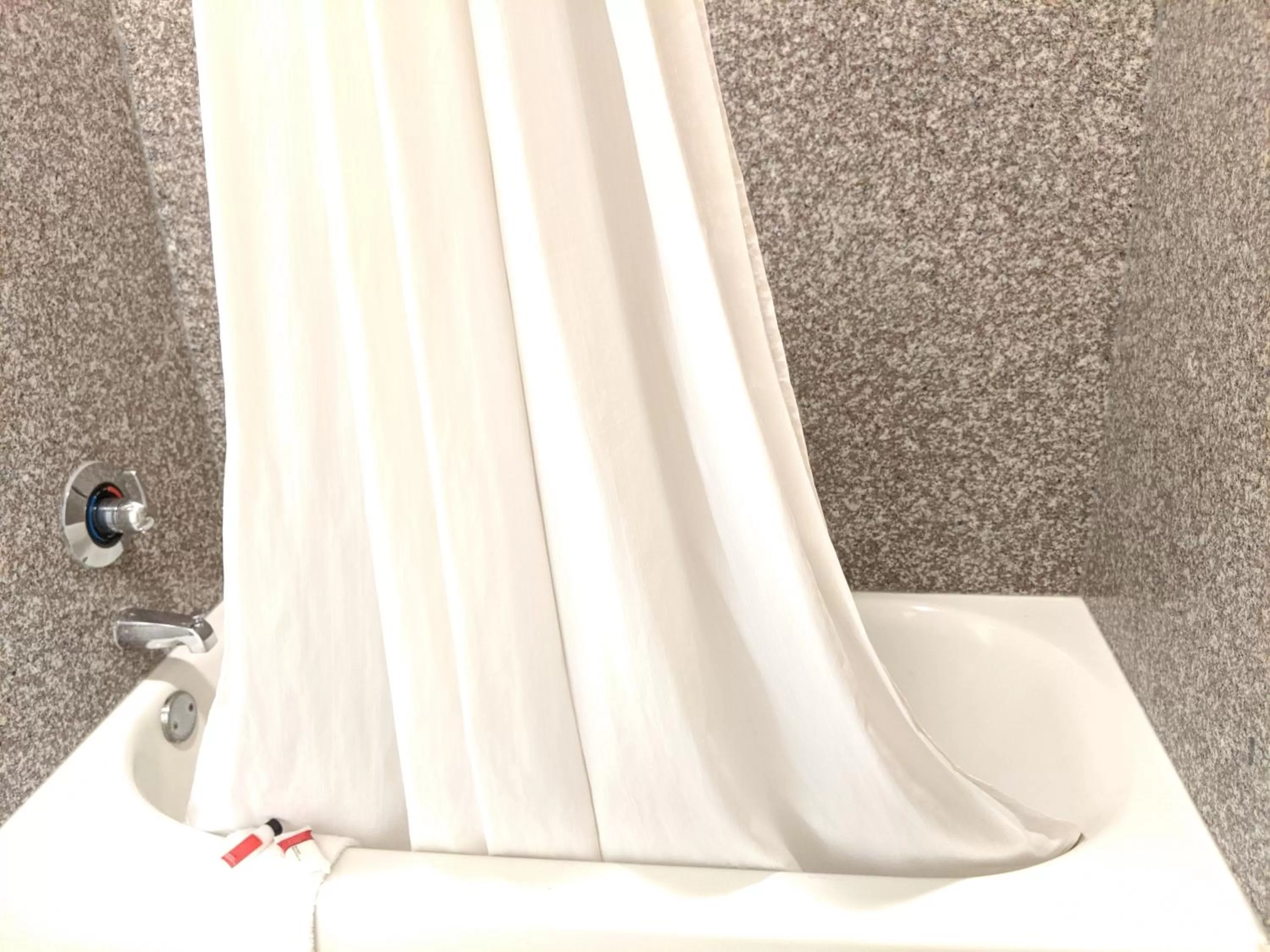 Bathroom in Super 8 by Wyndham Willowbrook Houston