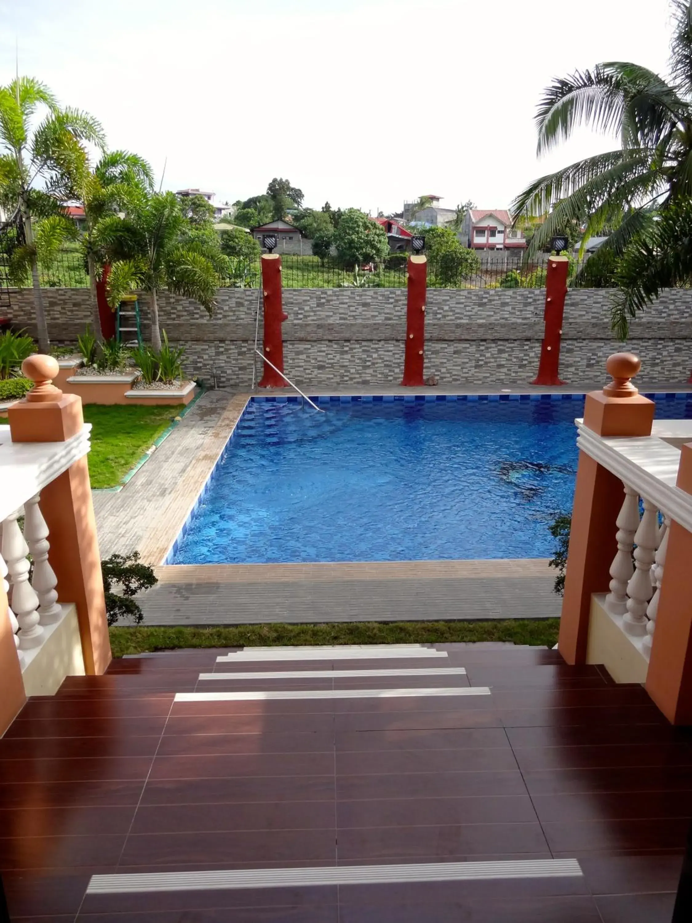 Swimming Pool in The Executive Villa Inn & Suites