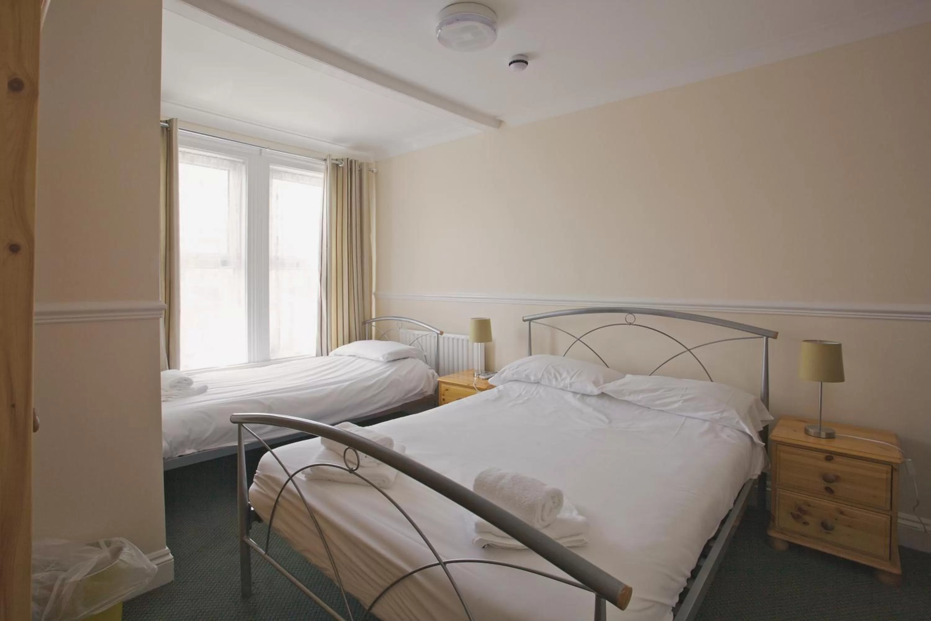 Bedroom in All Seasons Lodge Hotel