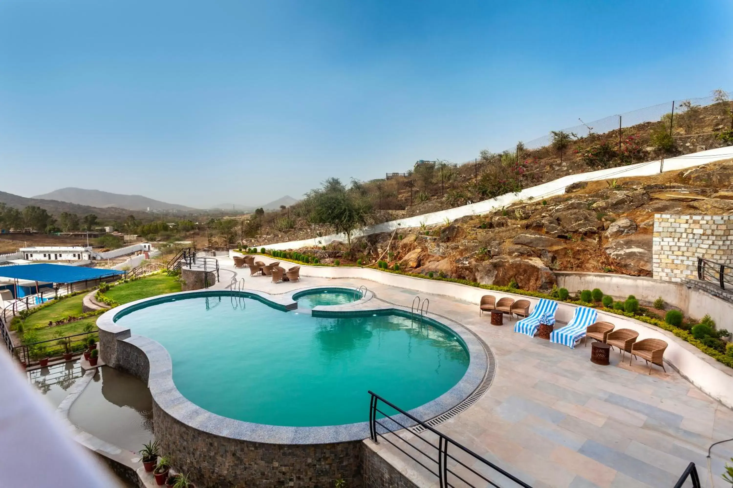 Swimming pool, Pool View in juSTa Sajjangarh Resort & Spa